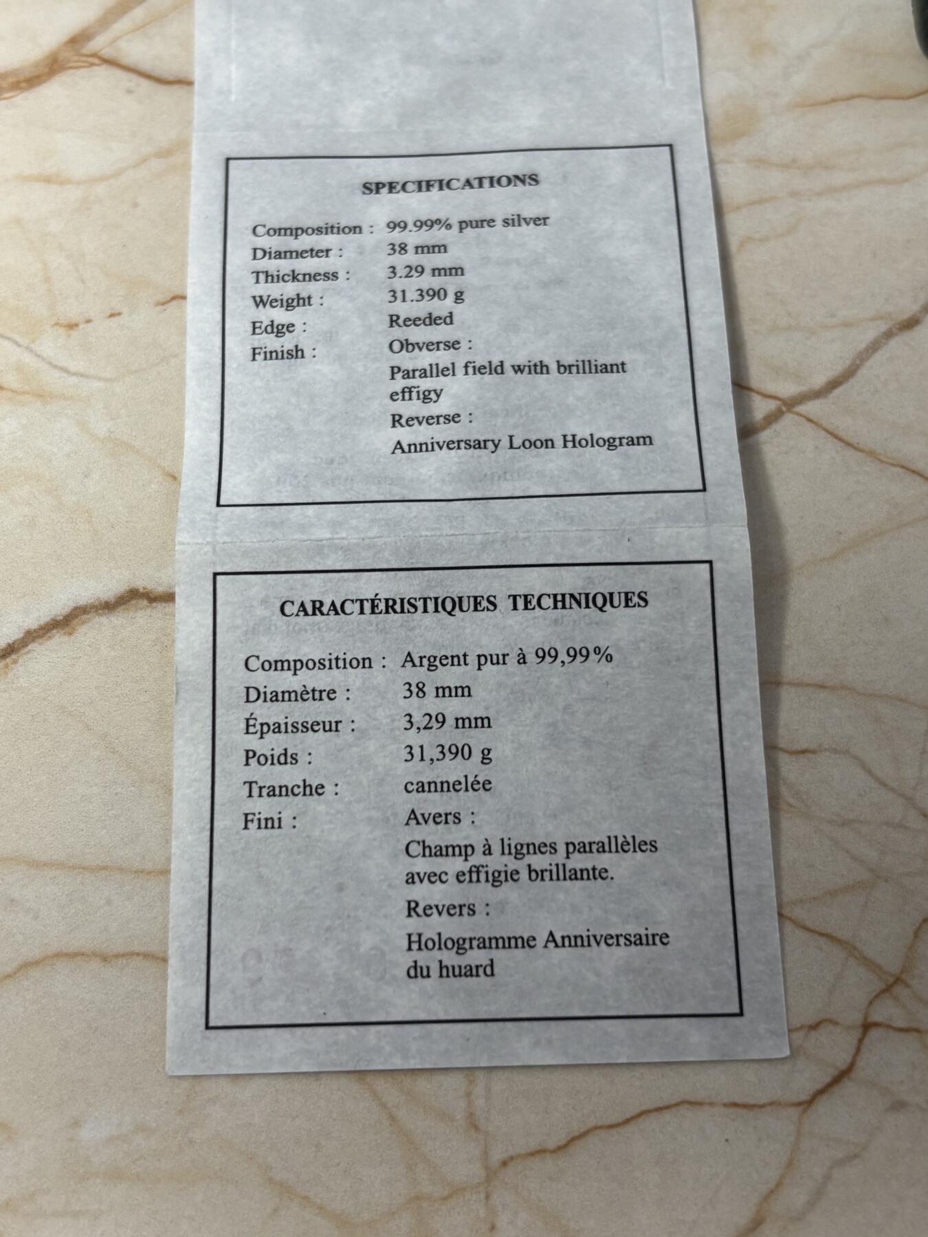 第184期拍卖 加拿大2002年潜鸟全息彩色1盎司纪念银币，9999银银价431，发行30000枚，有氧化