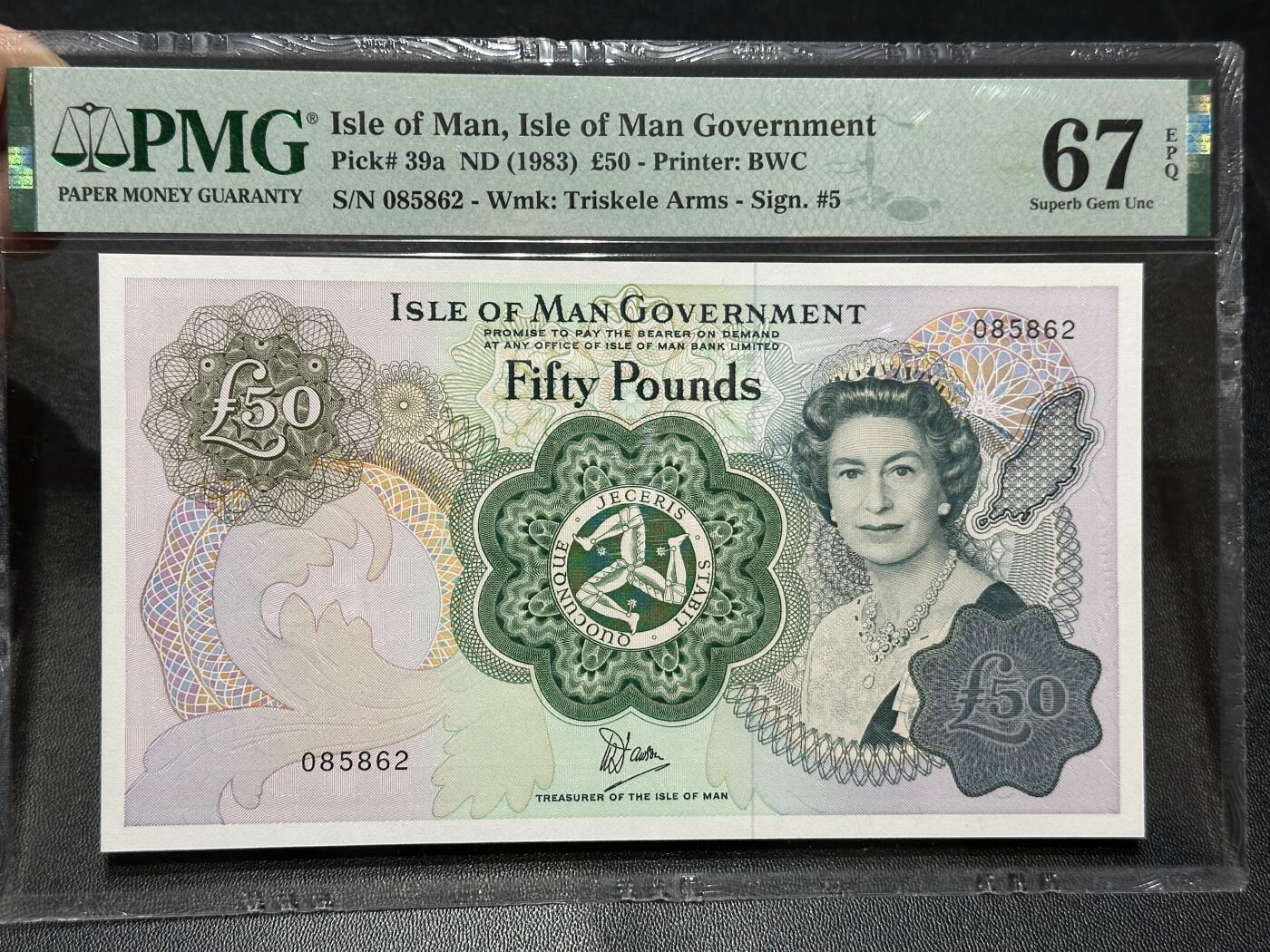 《外钞收藏家》第五百九十一期（畅拍场）（本平台长期征集拍品、欢迎藏友们联系合作） 1983年马恩岛50镑 PMG67 无47靓号尾862 BWC经典版