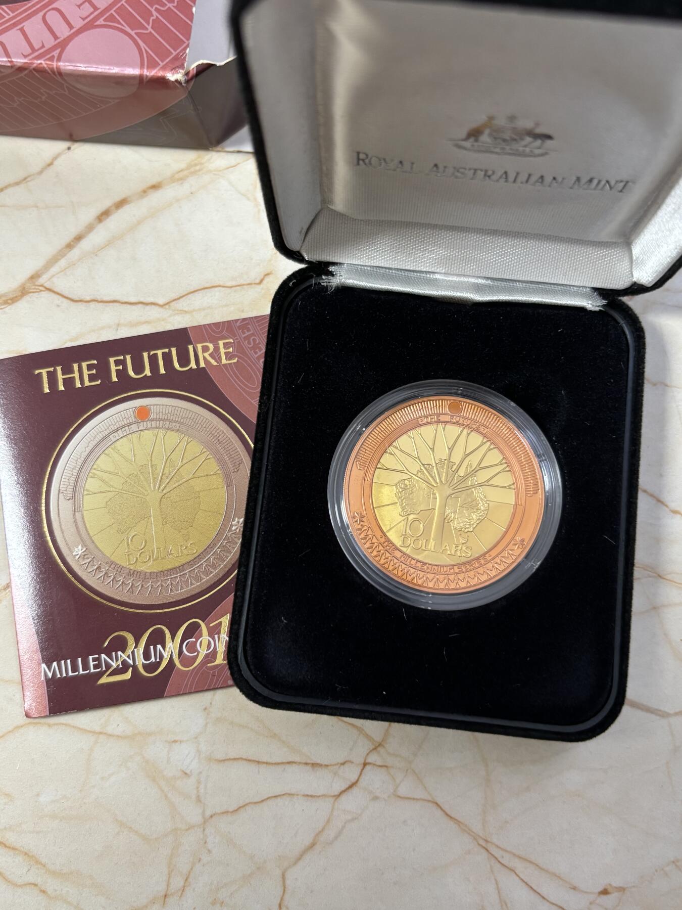 第184期拍卖 澳大利亚2001年千禧年系列未来双色精制纪念银币，999银，外圈铜，内圈银镀金，重量:1盎司，直径:38.74毫米发行：20000枚