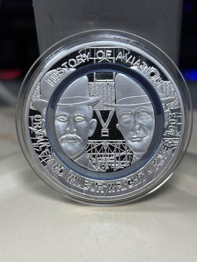 第184期拍卖 - 加纳2021莱特兄弟镶嵌聚合物环铜镍合金纪念币带证书，24.8克，发行5000枚