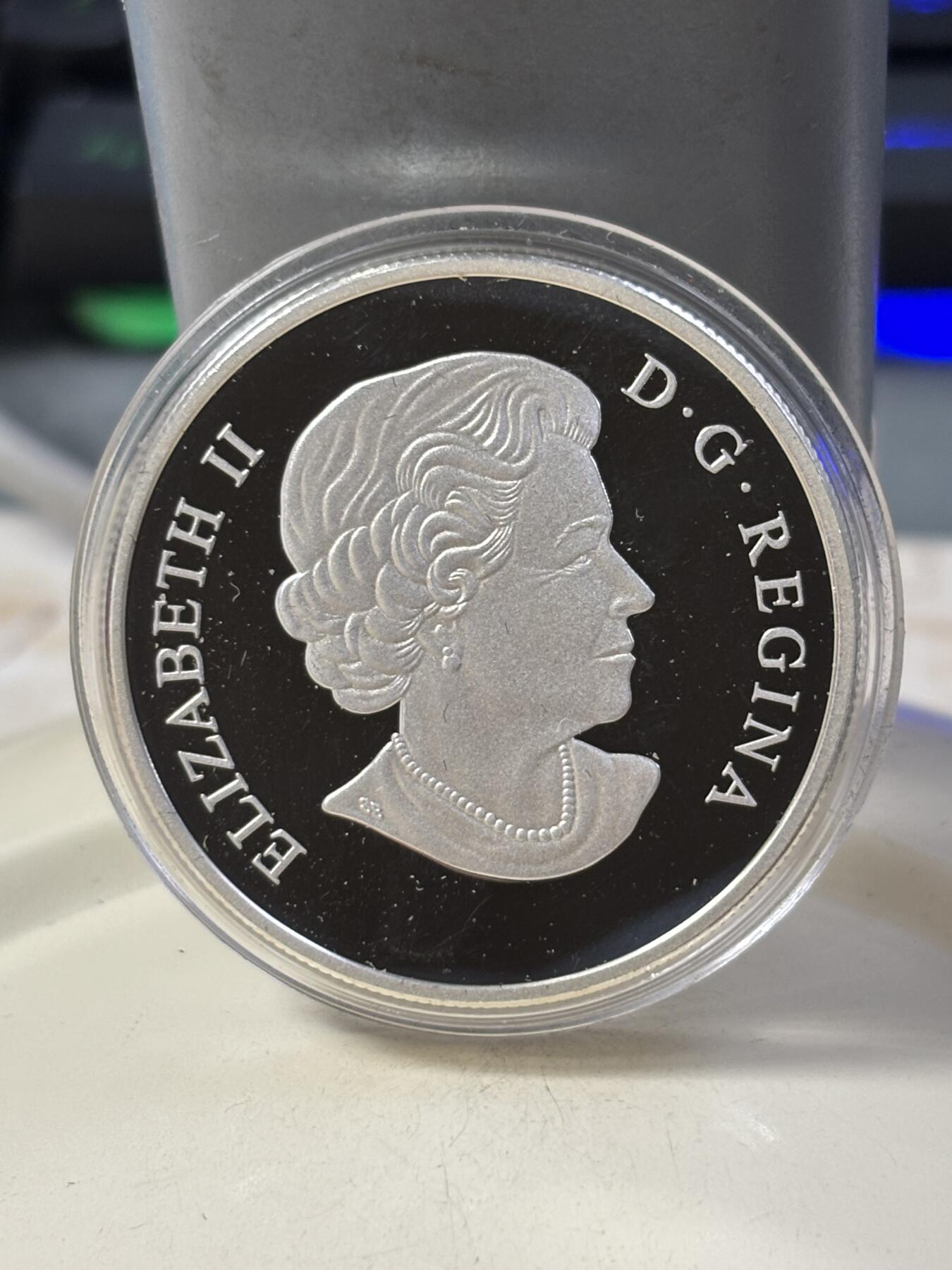 第184期拍卖 加拿大2016年中国生肖系列猴年猴子偷桃1盎司银币，9999银，31.39克，发行18888枚，有氧化