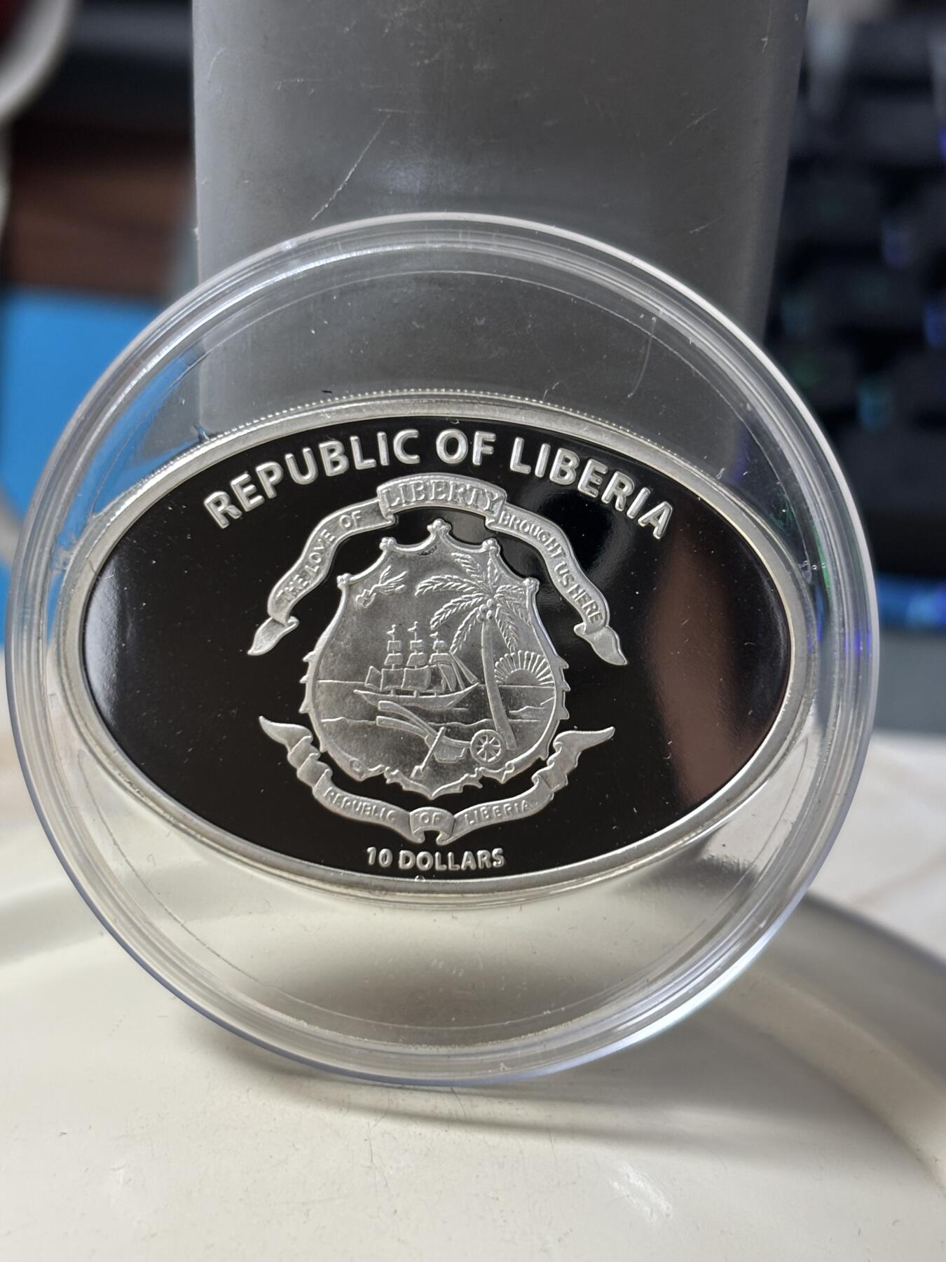 第184期拍卖 利比里亚2005年镶嵌泰坦尼克号打捞煤块镀金版银币带证书，925银镀999金，25克