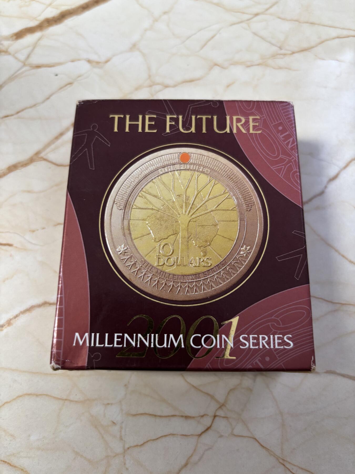 第184期拍卖 澳大利亚2001年千禧年系列未来双色精制纪念银币，999银，外圈铜，内圈银镀金，重量:1盎司，直径:38.74毫米发行：20000枚