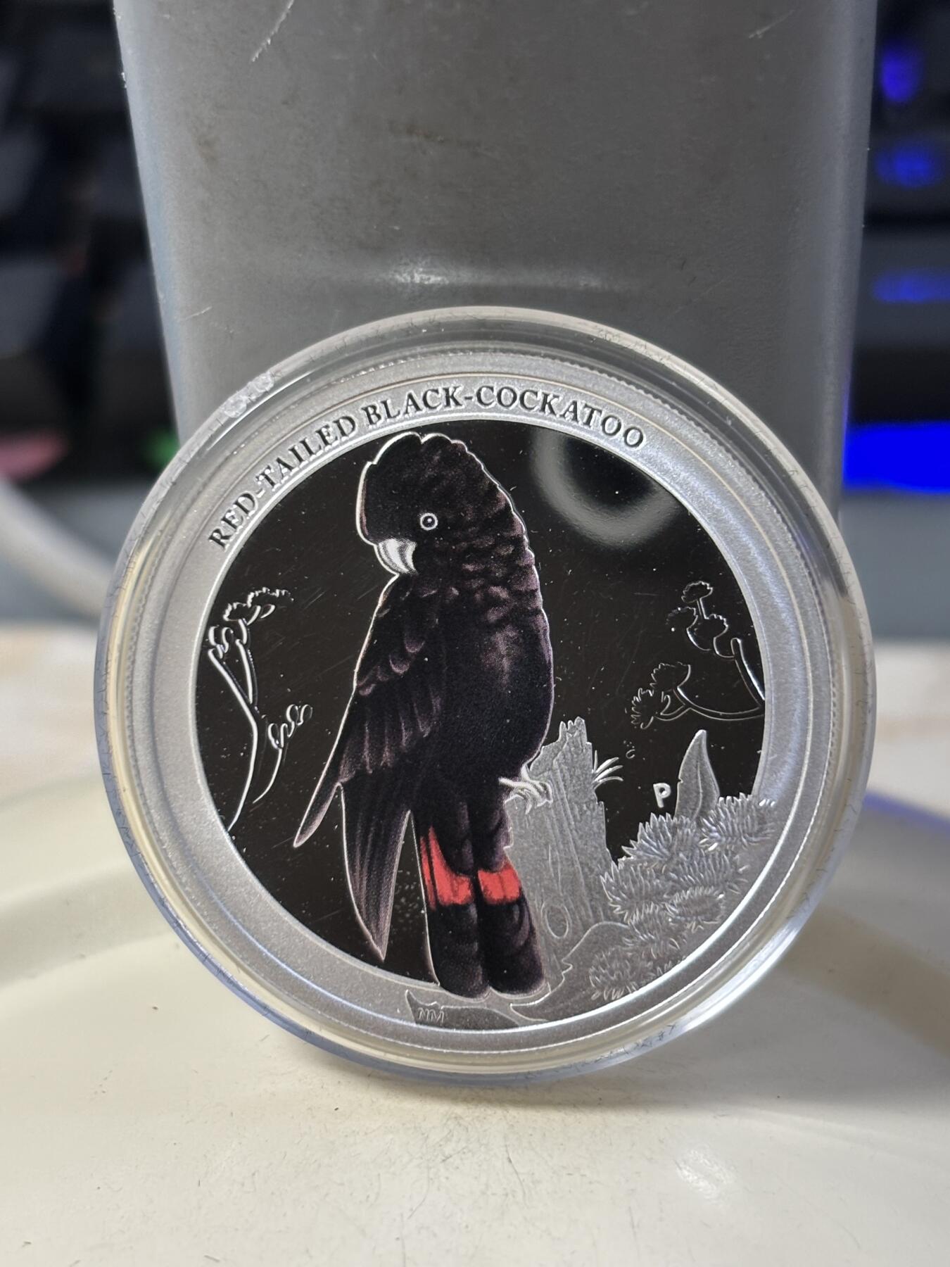 第184期拍卖 澳大利亚2013年雀鸟系列红尾黑凤头鹦鹉银币，999银，15.591克，发行10000枚