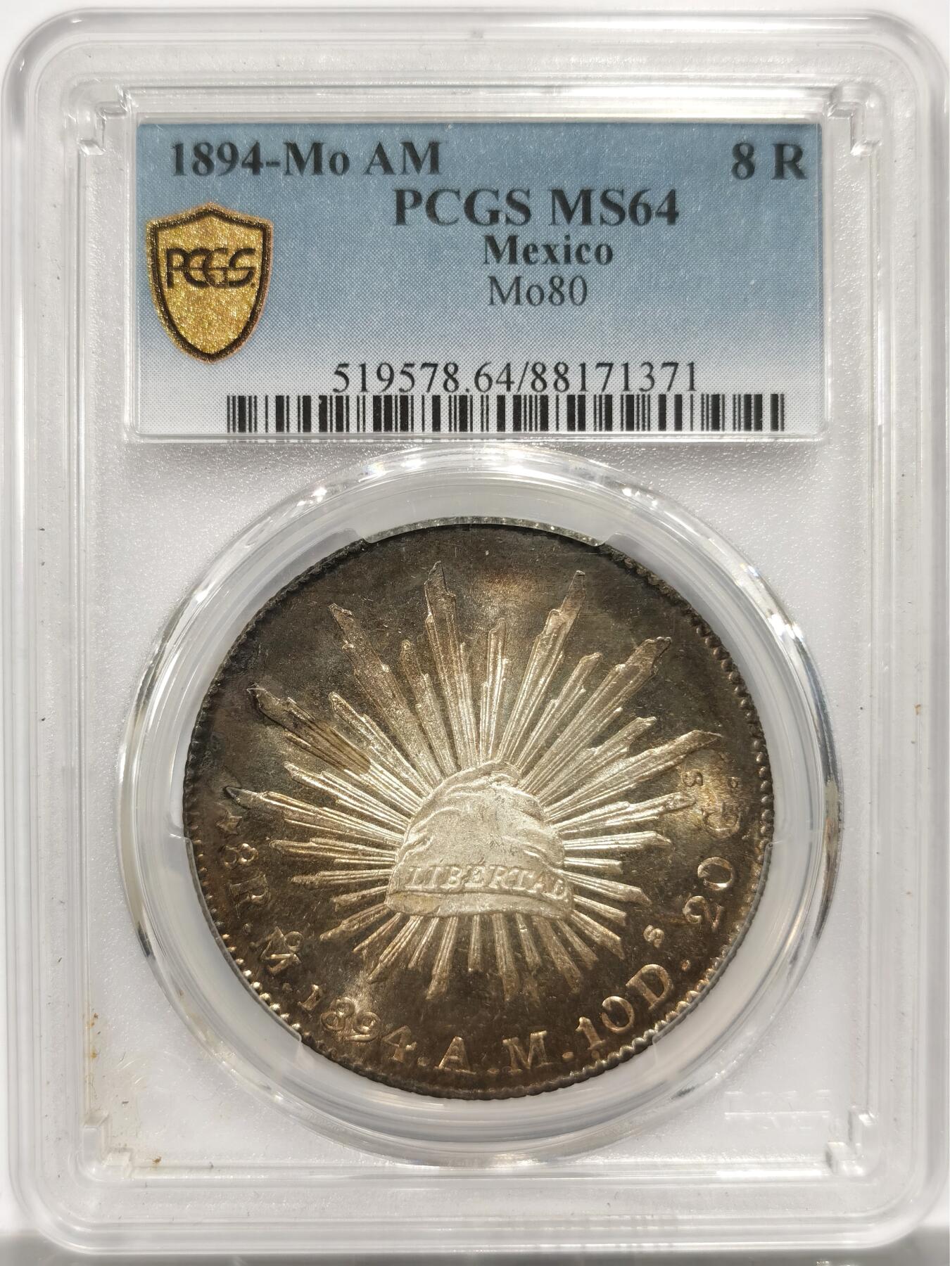 博洋堂世界钱币拍卖第150期（全场包邮） PCGS MS64 墨西哥1894年Mo厂鹰洋，黑彩包浆加回转十字光，状态真的很赞，绝对难得一见的。