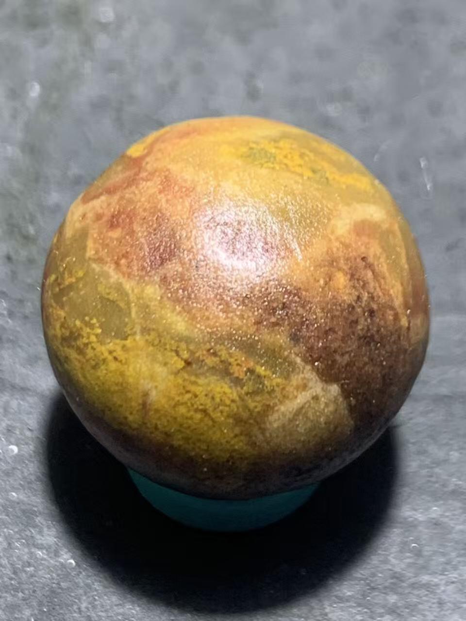 亚光战国红玛瑙手工雕刻佛字随形圆珠一颗