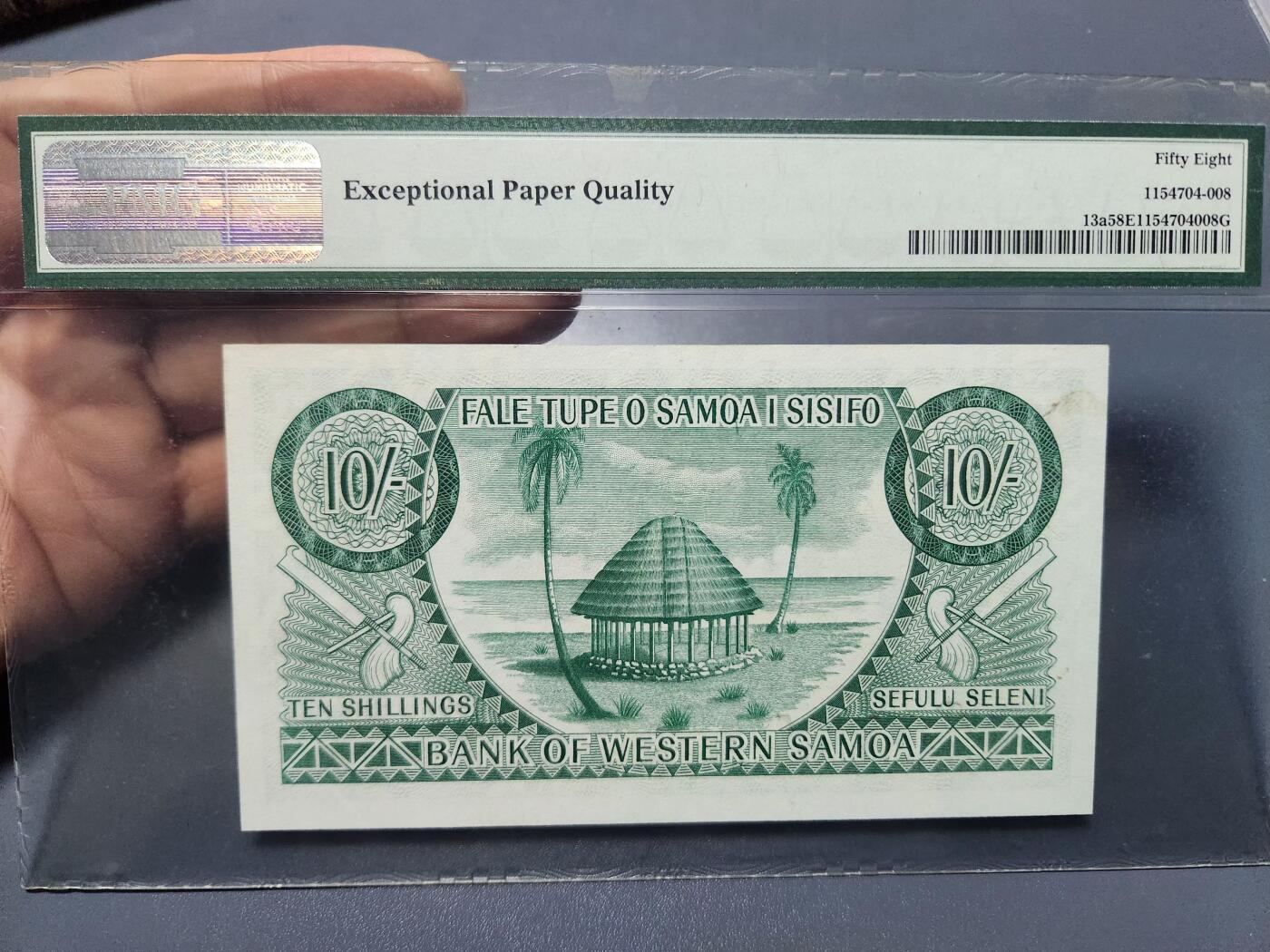 12月5号晚上8点 评级币专场外国纸币自动截拍第68场 稀少初版首签 西萨摩亚10先令 1963年 大洋洲纸币PMG58