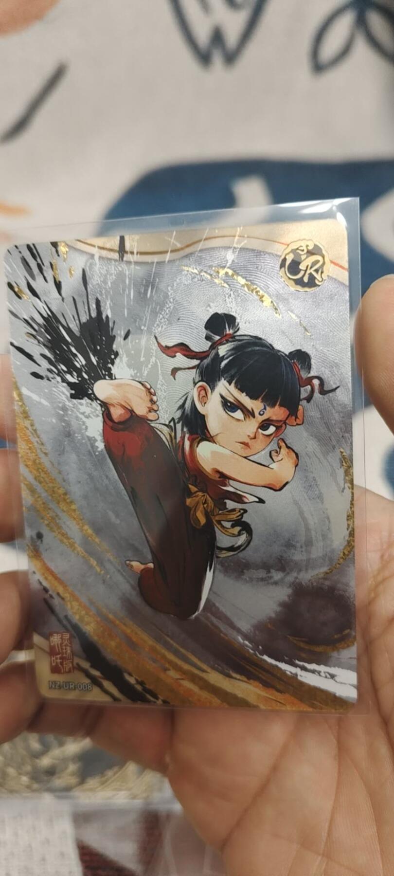 秋原瞳的小店第二十九期（持续收拍，今年的最后的一次旅行，期待在有雪的路上） 卡游哪吒ur哪吒