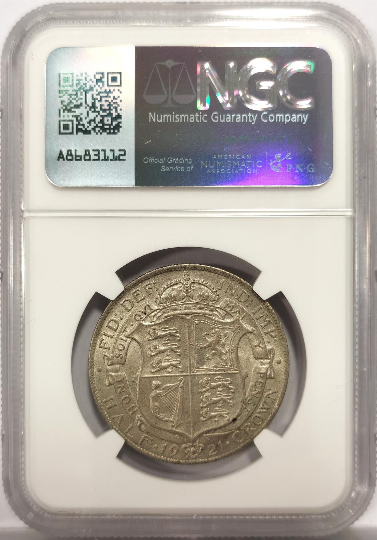 博洋堂世界钱币拍卖第150期（全场包邮） NGC MS64 英国1921年乔治五世半克朗银币，英系藏家Cope旧藏。完全未流通状态，币面透出霜光。这是乔五半克朗的第二个版本比第三版细瘦的盾徽好看太多，到64分很不容易。