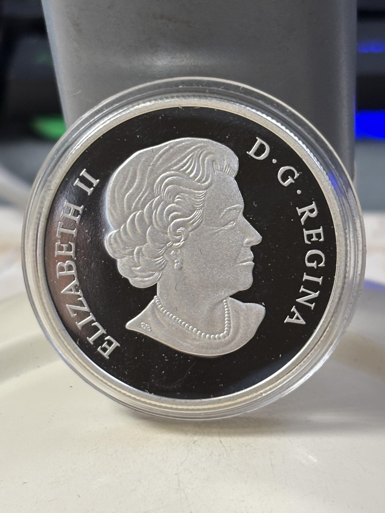 第184期拍卖 加拿大2016年中国生肖系列猴年猴子偷桃1盎司银币，9999银，31.39克，发行18888枚，有氧化