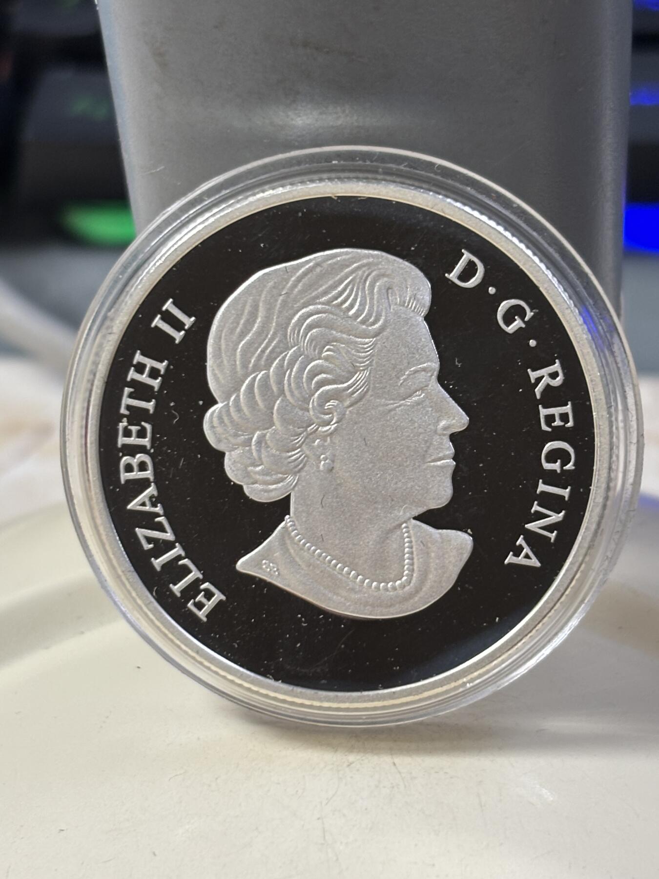 第184期拍卖 加拿大2016年中国生肖系列猴年猴子偷桃1盎司银币，9999银，31.39克，发行18888枚，有氧化