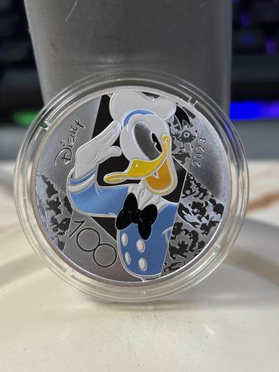 第184期拍卖 - 法国2023年迪士尼米老鼠和唐老鸭诞生100年彩银币，999银，22.2克，发行5000枚