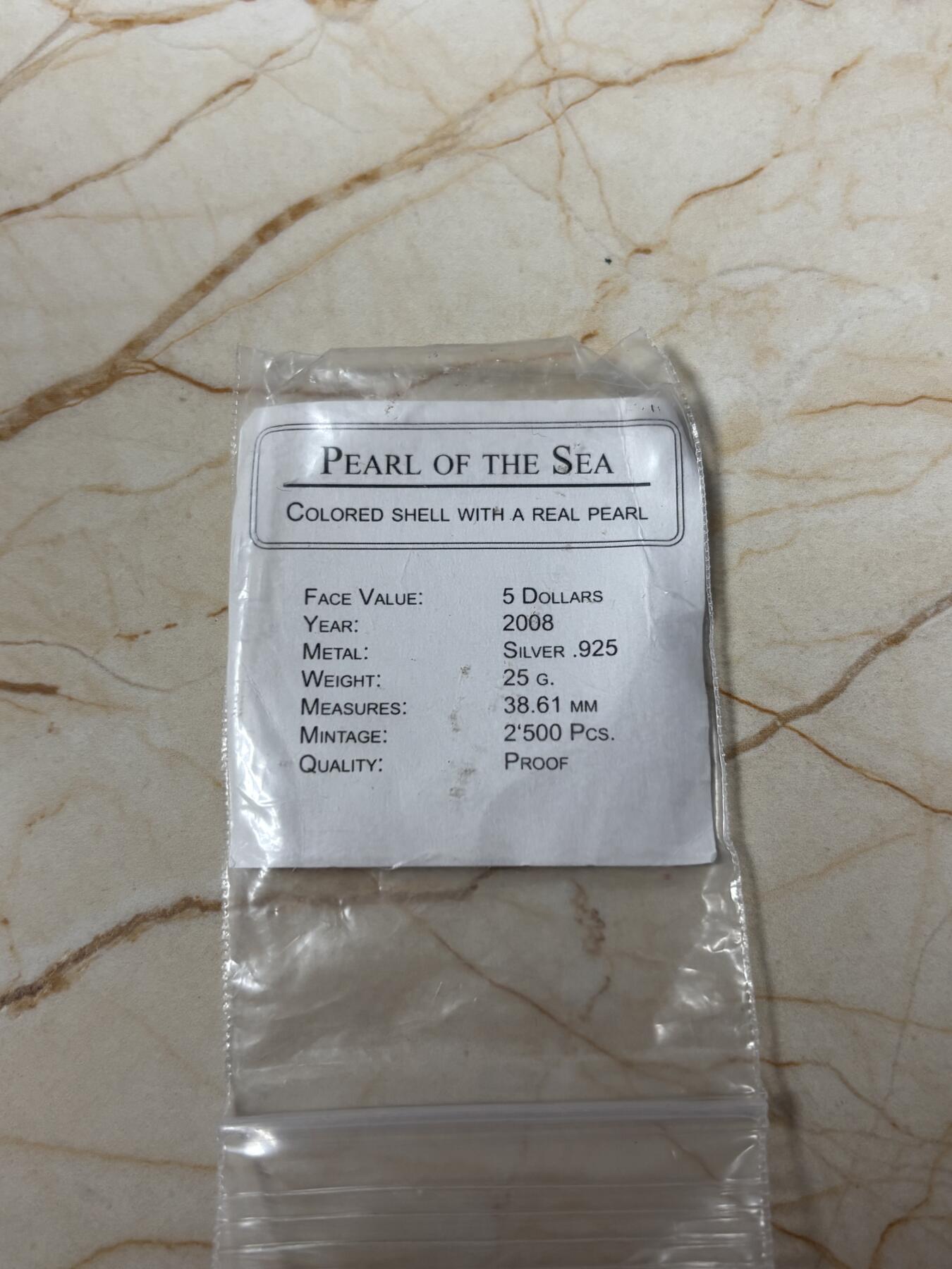 第184期拍卖 帕劳2008年珍珠系列镶嵌实体深海蓝珍珠纪念彩银币带证书，925银银价321，发行2500枚，有氧化