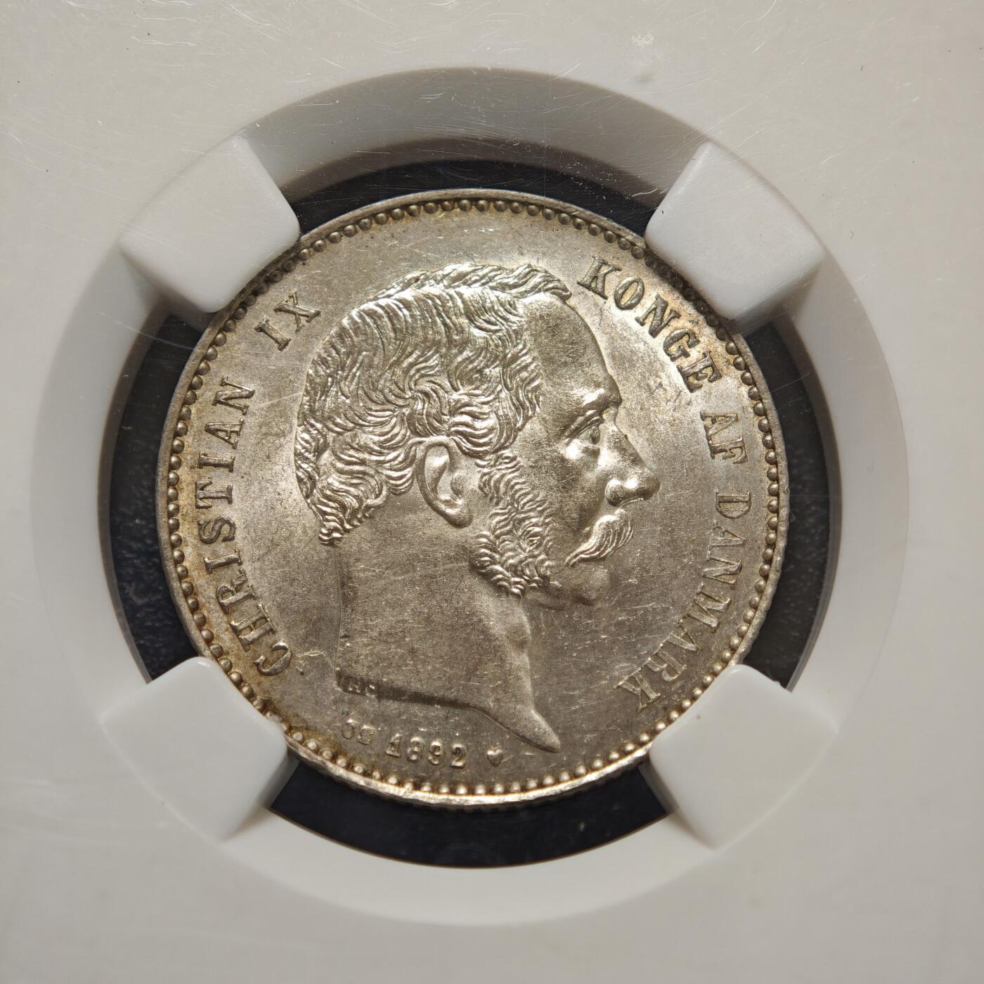 【德藏】世界币章拍卖第156期（拍品征集中~欢迎藏友联系） 1892年 丹麦克里斯蒂安九世1克朗银币 NGC MS63 淡黄油包浆 转光十足