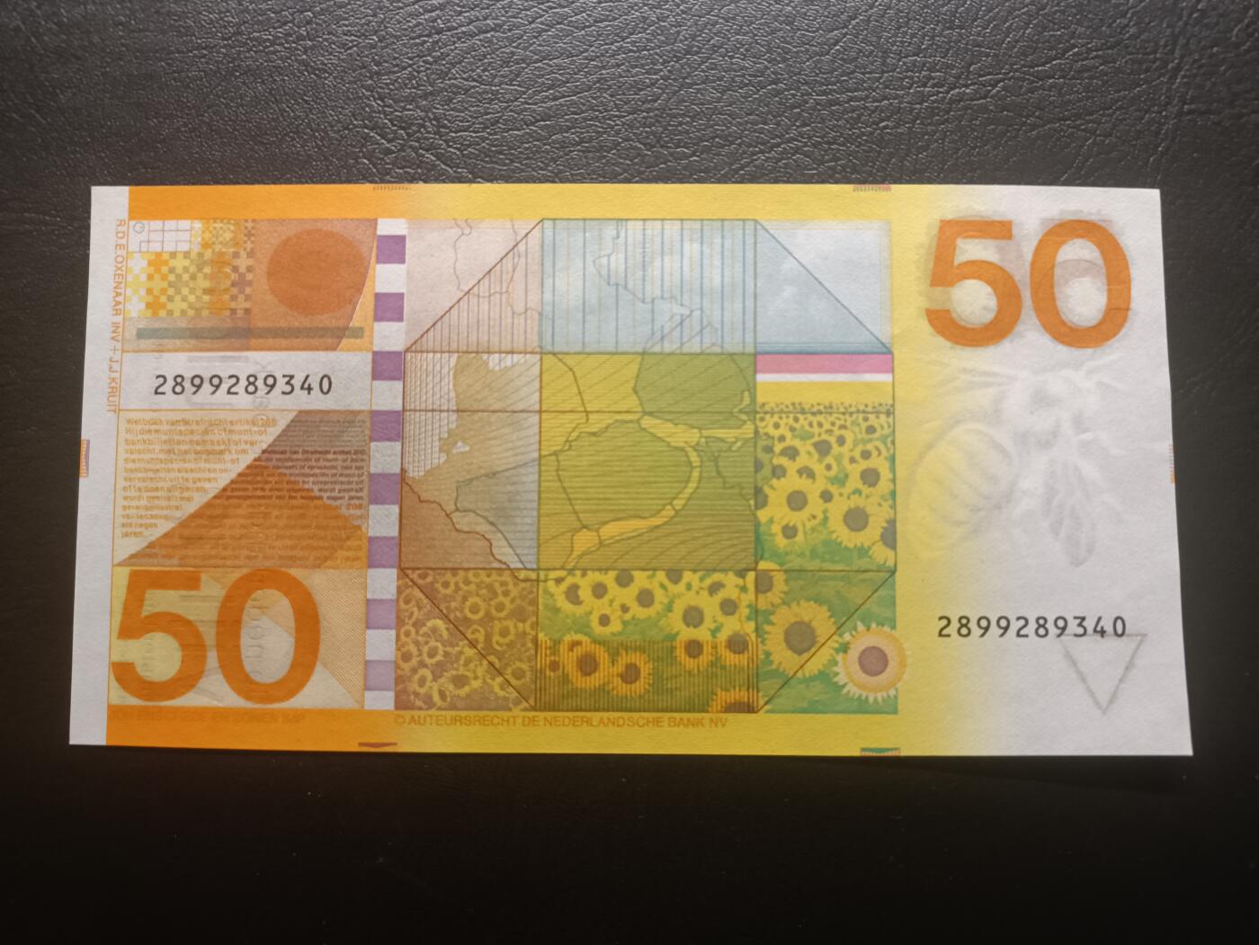 2025十二月第一期，总206期 荷兰1982版50盾UNC-左上角有油印，荷兰盾三剑客之一的向日葵图案