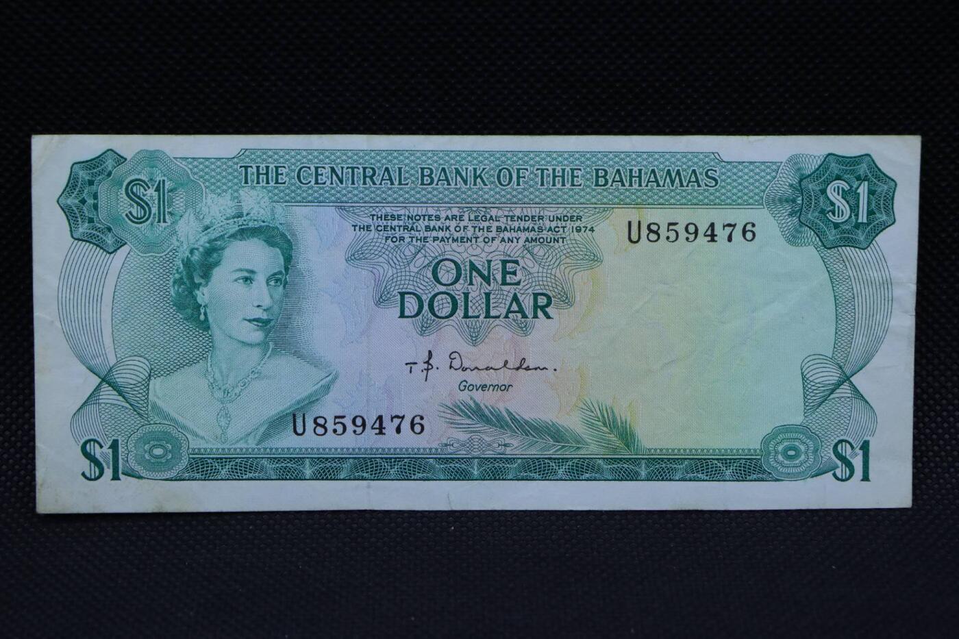 【淘币小摊】限时拍第八百二十一拍  纸币场  满百包邮可预留两周  周一统一发货   巴哈马1973年彩背1元纸币【有折】