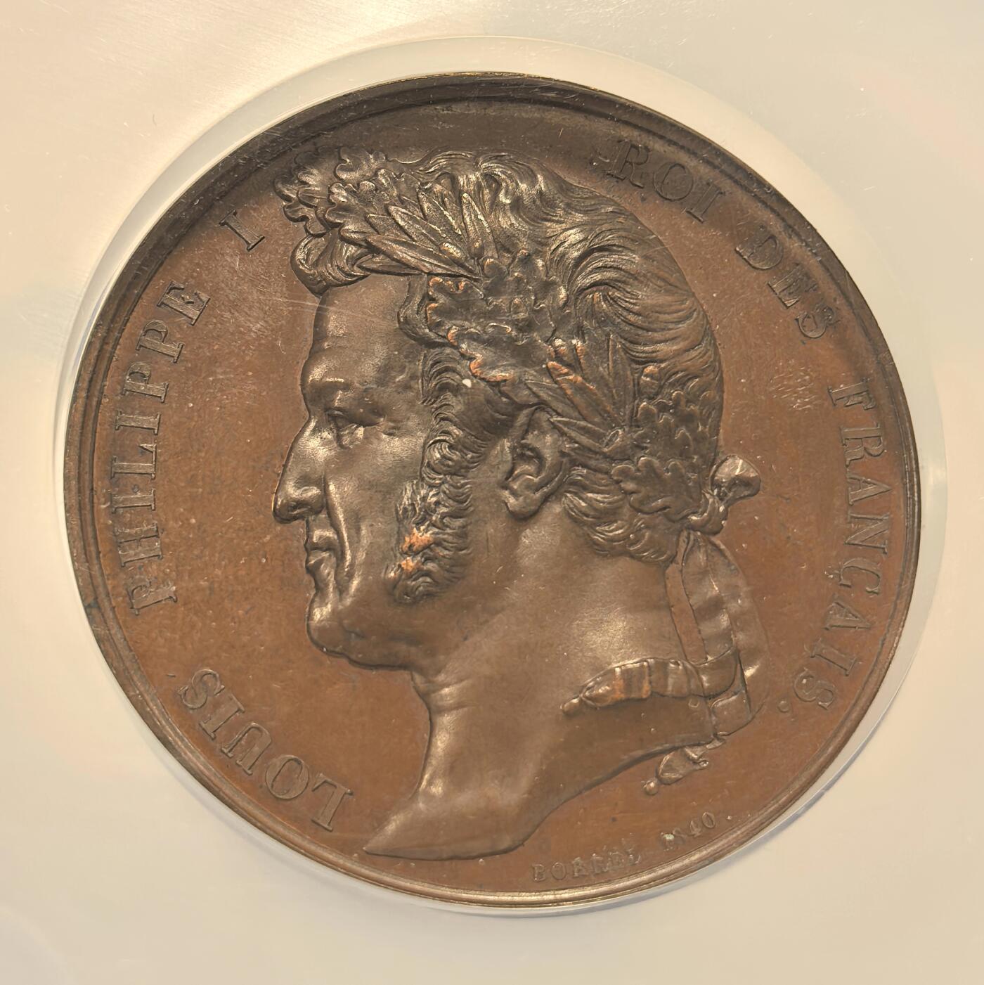 博洋堂世界钱币拍卖第150期（全场包邮） NGC MS64 法国1844年菲利普一世伊斯利战役胜利纪念大铜章，52mm大规格超大盒，铜章正面为法国国王菲利普一世头像，高浮雕好品，64高分很不易。伊利斯战役为法国元帅托马斯罗伯特比若指挥法军与摩洛哥在伊利斯河畔爆发的的军事冲突，法国经该战役战胜摩洛哥并迫使摩洛哥签署条约结束冲突。