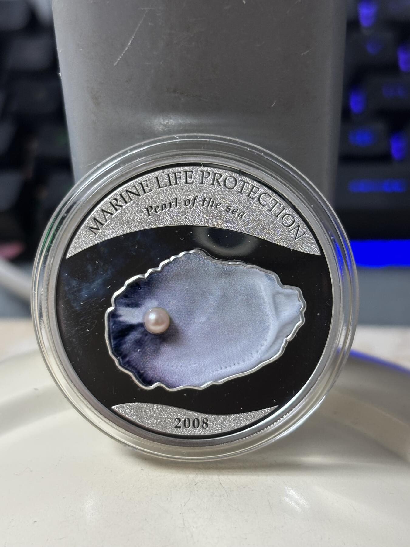 第184期拍卖 帕劳2008年珍珠系列镶嵌实体深海蓝珍珠纪念彩银币带证书，925银银价321，发行2500枚，有氧化