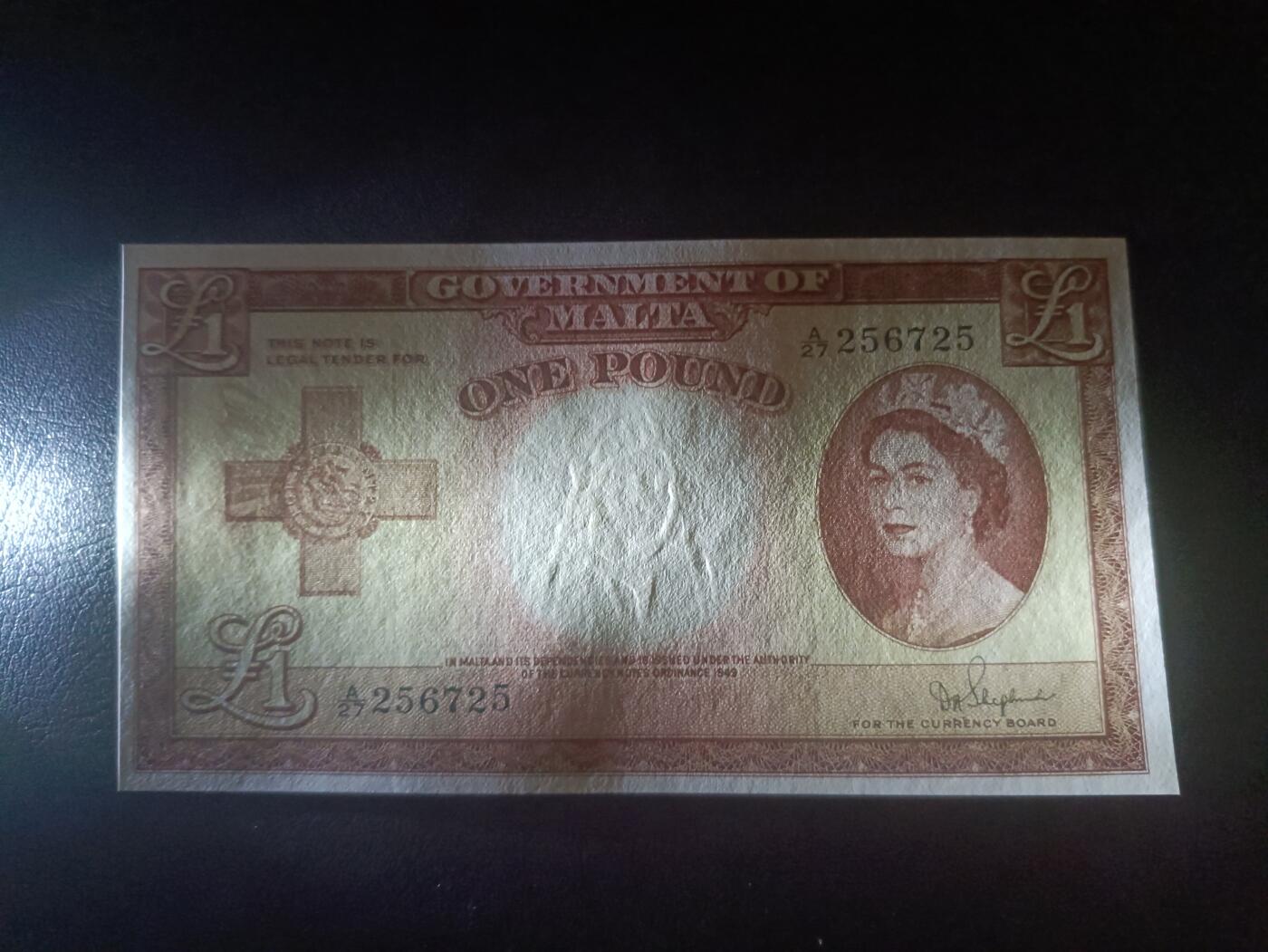 2025十二月第一期，总206期 英属马耳他1952版1镑UNC-，大冠女王，后期褐色版本