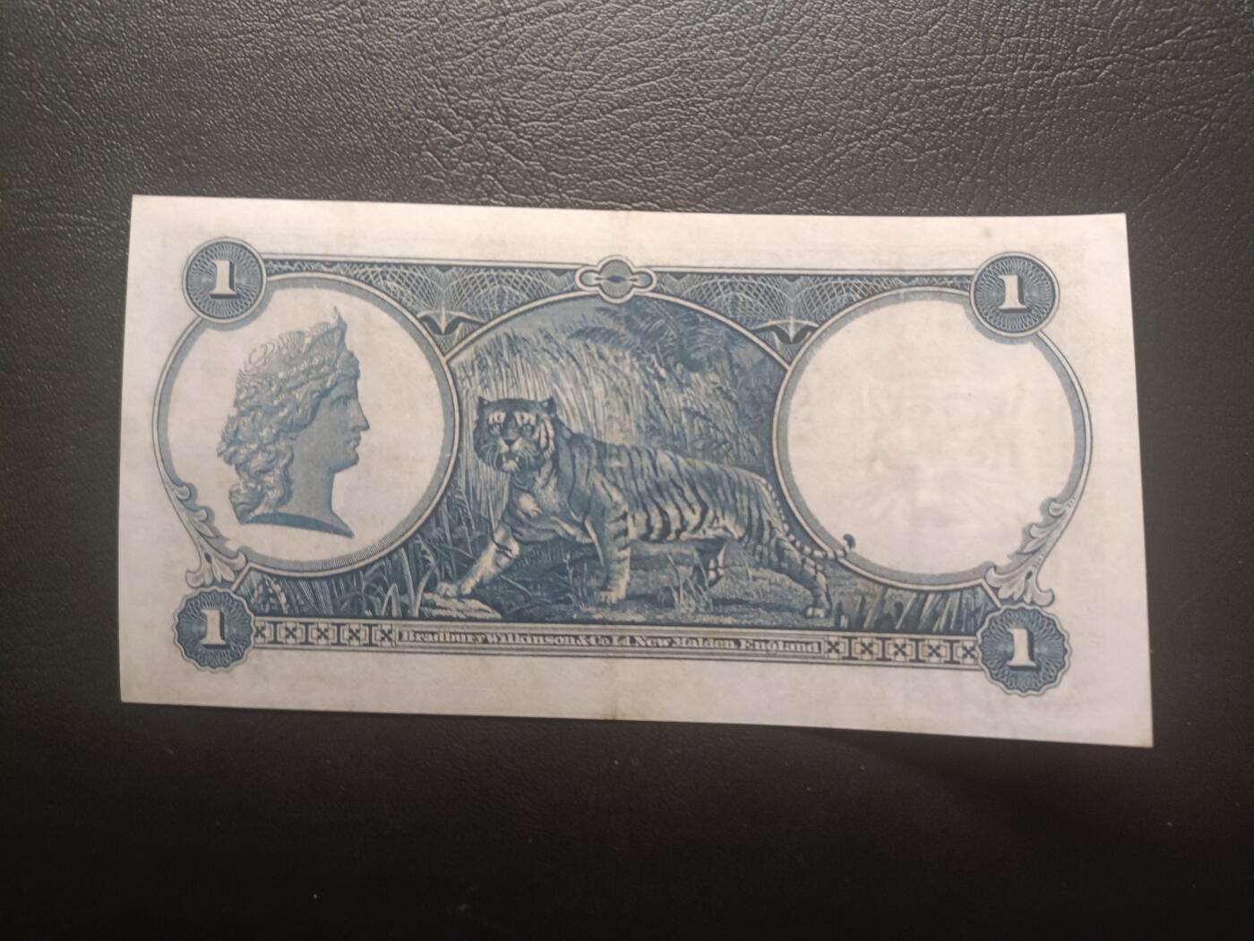 2025十二月第一期，总206期 英属海峡殖民地1935版1元AUNC无47豹子身222，二战期间日本占领时期特意的掠夺和销毁，导致此时期纸币较为稀有，乔治五世国王和老虎