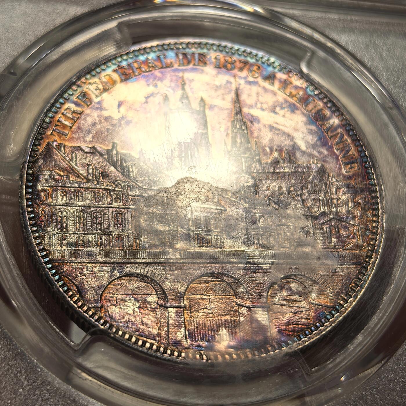 博洋堂世界钱币拍卖第150期（全场包邮） NGC UNC 瑞士1876年洛桑射击节5法郎大银币，景观五彩，背面盒子小糊，币无影响