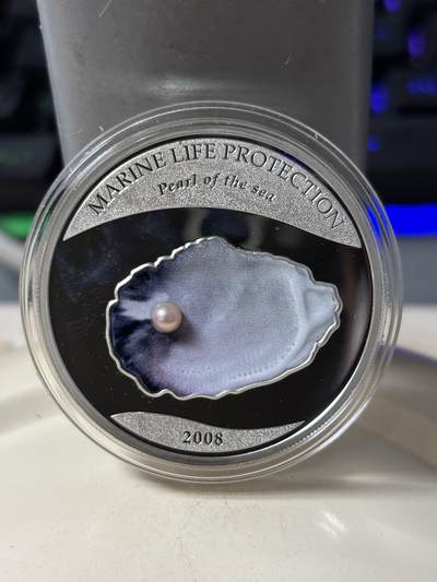 第184期拍卖 - 帕劳2008年珍珠系列镶嵌实体深海蓝珍珠纪念彩银币带证书，925银银价321，发行2500枚，有氧化