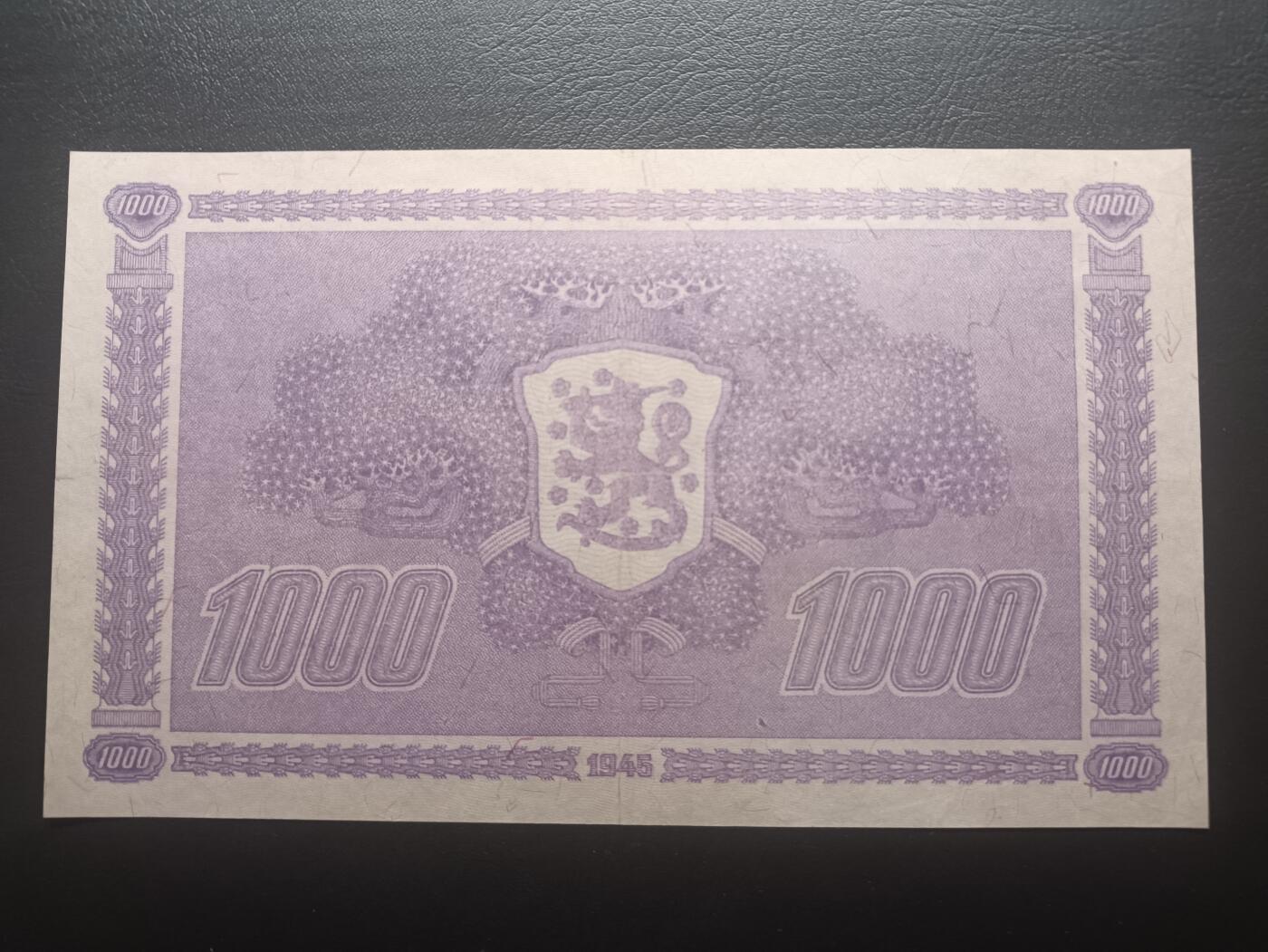 2025十二月第一期，总206期 芬兰1945年1000马克AUNC，此系列极稀有的大票幅大面值，象征着民族的起源和前进的意境画和国徽