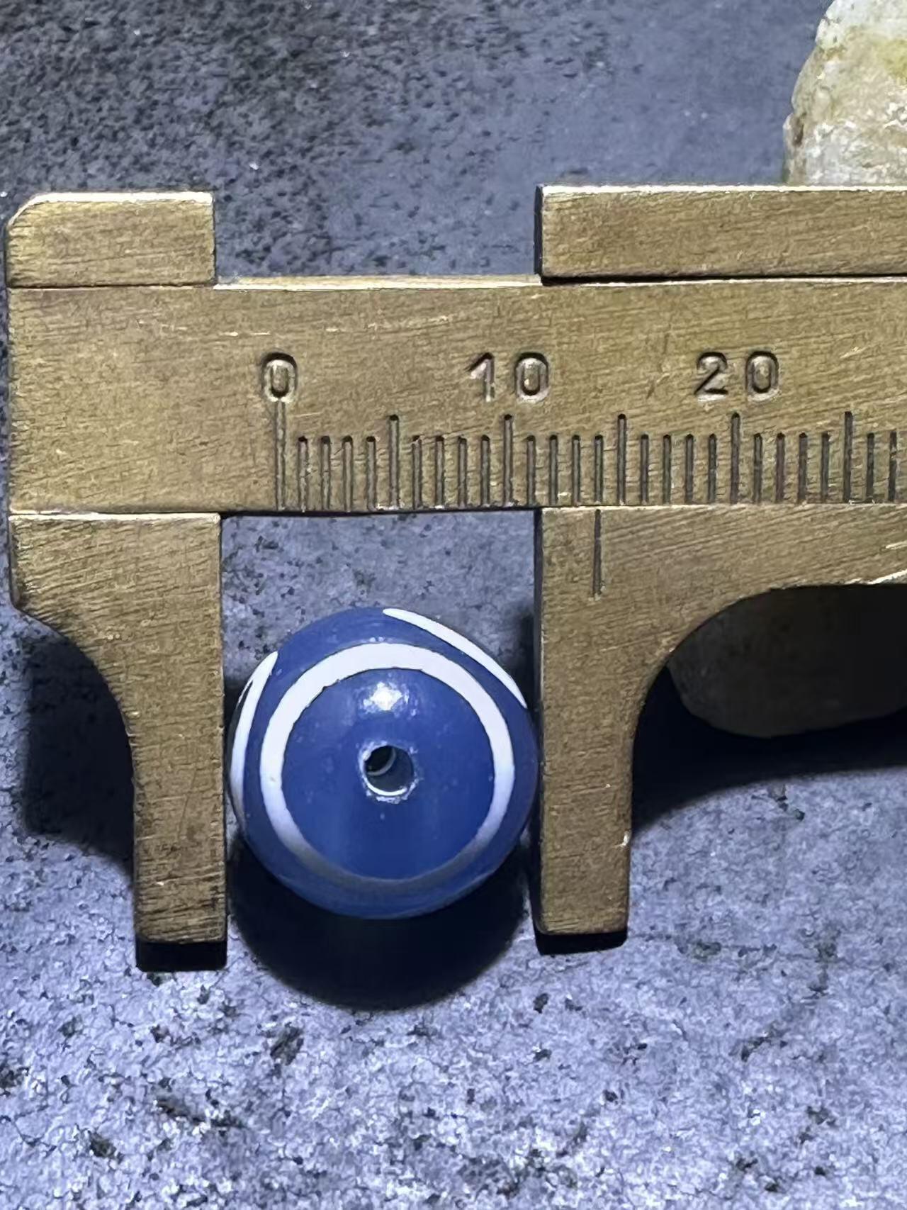 仅此一颗，精美藏传蓝玉髓金钱钩天珠一颗