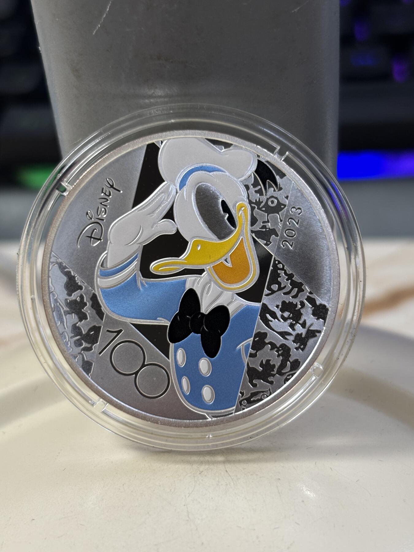 第184期拍卖 法国2023年迪士尼米老鼠和唐老鸭诞生100年彩银币，999银，22.2克，发行5000枚