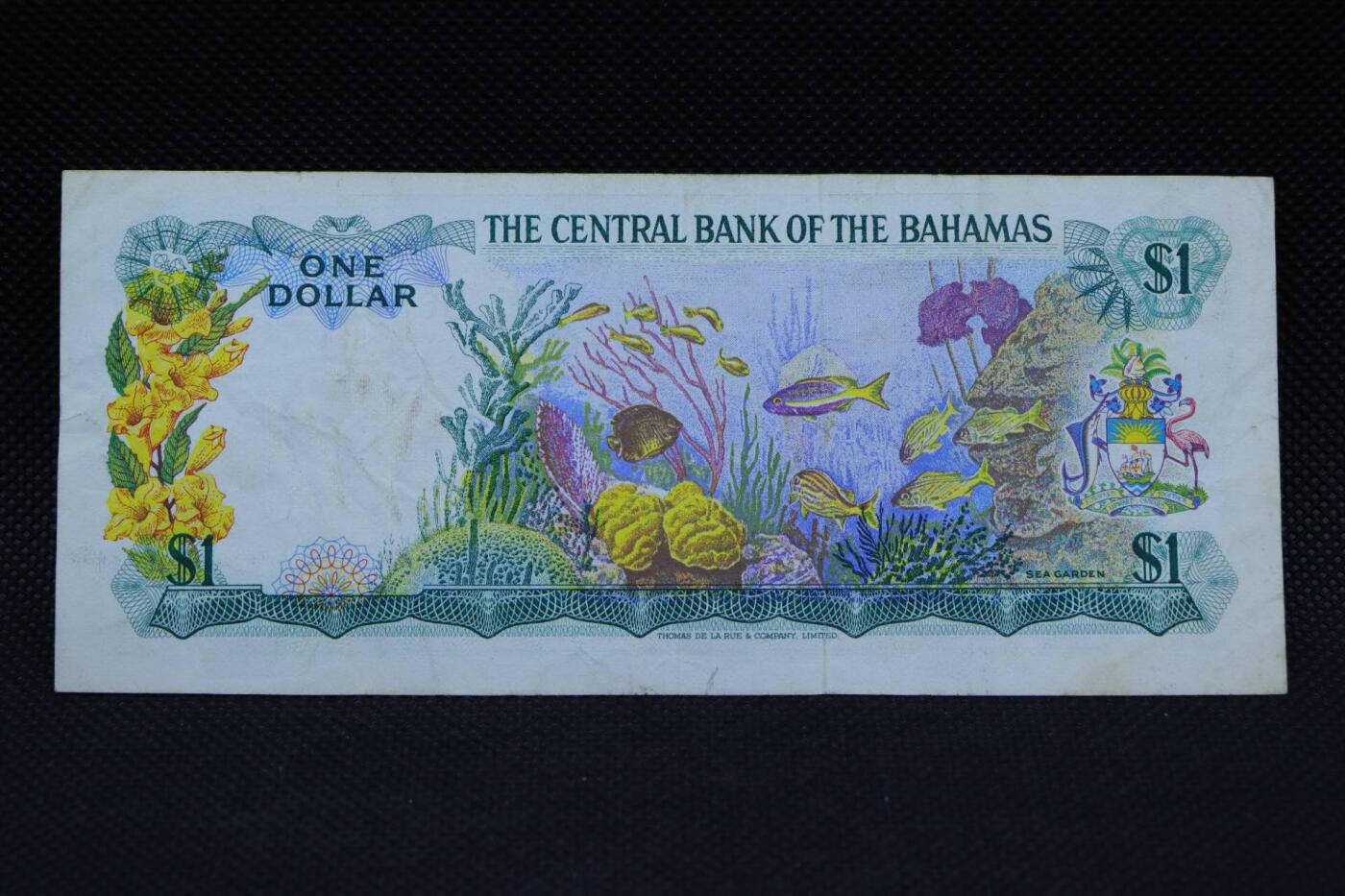 【淘币小摊】限时拍第八百二十一拍  纸币场  满百包邮可预留两周  周一统一发货   巴哈马1973年彩背1元纸币【有折】