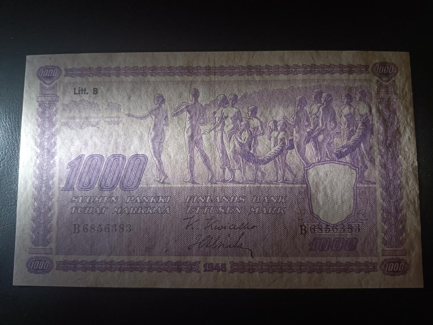 2025十二月第一期，总206期 芬兰1945年1000马克AUNC，此系列极稀有的大票幅大面值，象征着民族的起源和前进的意境画和国徽