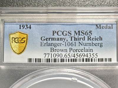 【德藏】世界币章拍卖第156期（拍品征集中~欢迎藏友联系） - 1934年 德国民族社会主义工人党纽伦堡军演陶瓷镀金纪念章 直径约46mm PCGS MS65 亚军分 大盒封装 少见品种！（原图请查询PCGS评级官网）