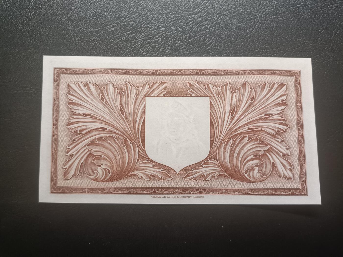 2025十二月第一期，总206期 英属马耳他1952版1镑UNC-，大冠女王，后期褐色版本