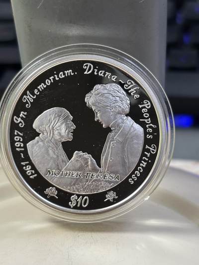 第184期拍卖 - 获奖塞拉利昂1997年戴安娜和特雷莎1盎司纪念银币，925银，发行10000枚，获1999年度克劳斯最富激情币大奖