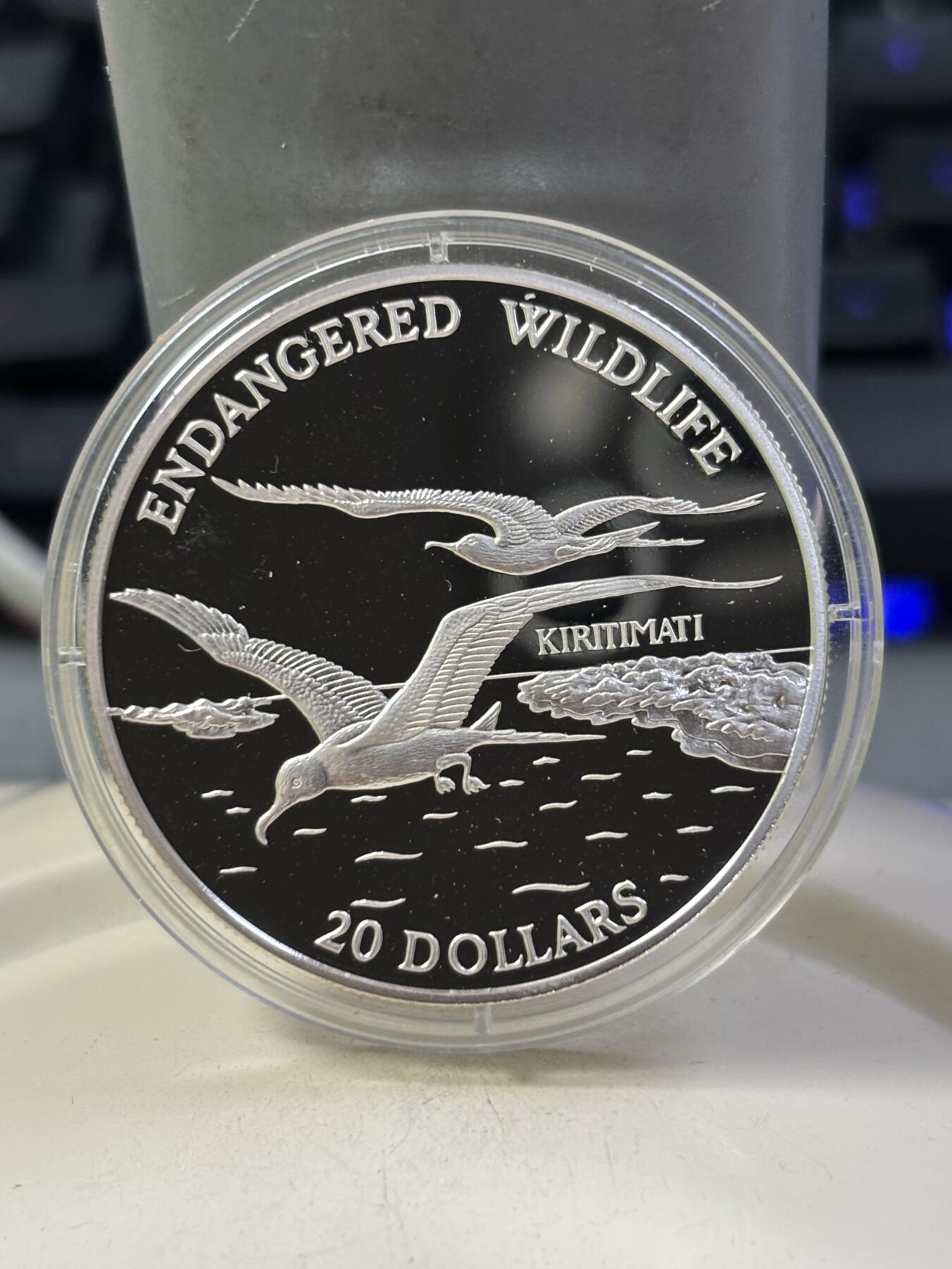 第184期拍卖 基里巴斯1992年保护濒危野生动物精制1盎司念大银币，925银银价399，