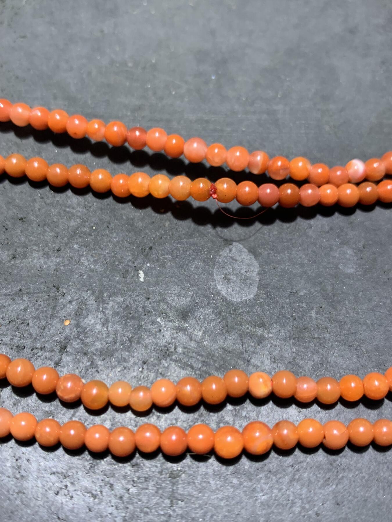 川料南红玛瑙柿子红小米珠手串一条，