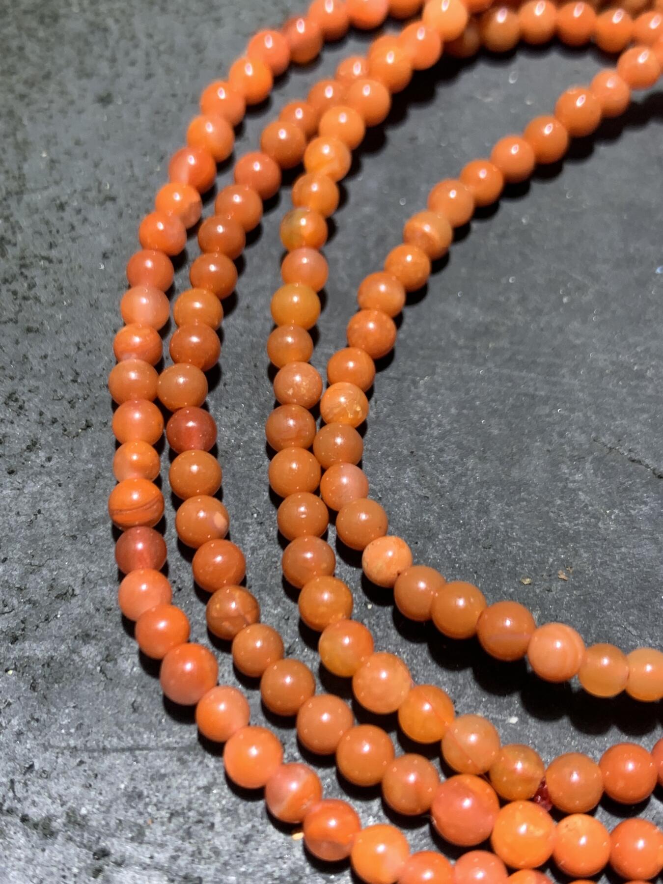 川料南红玛瑙柿子红小米珠手串一条，