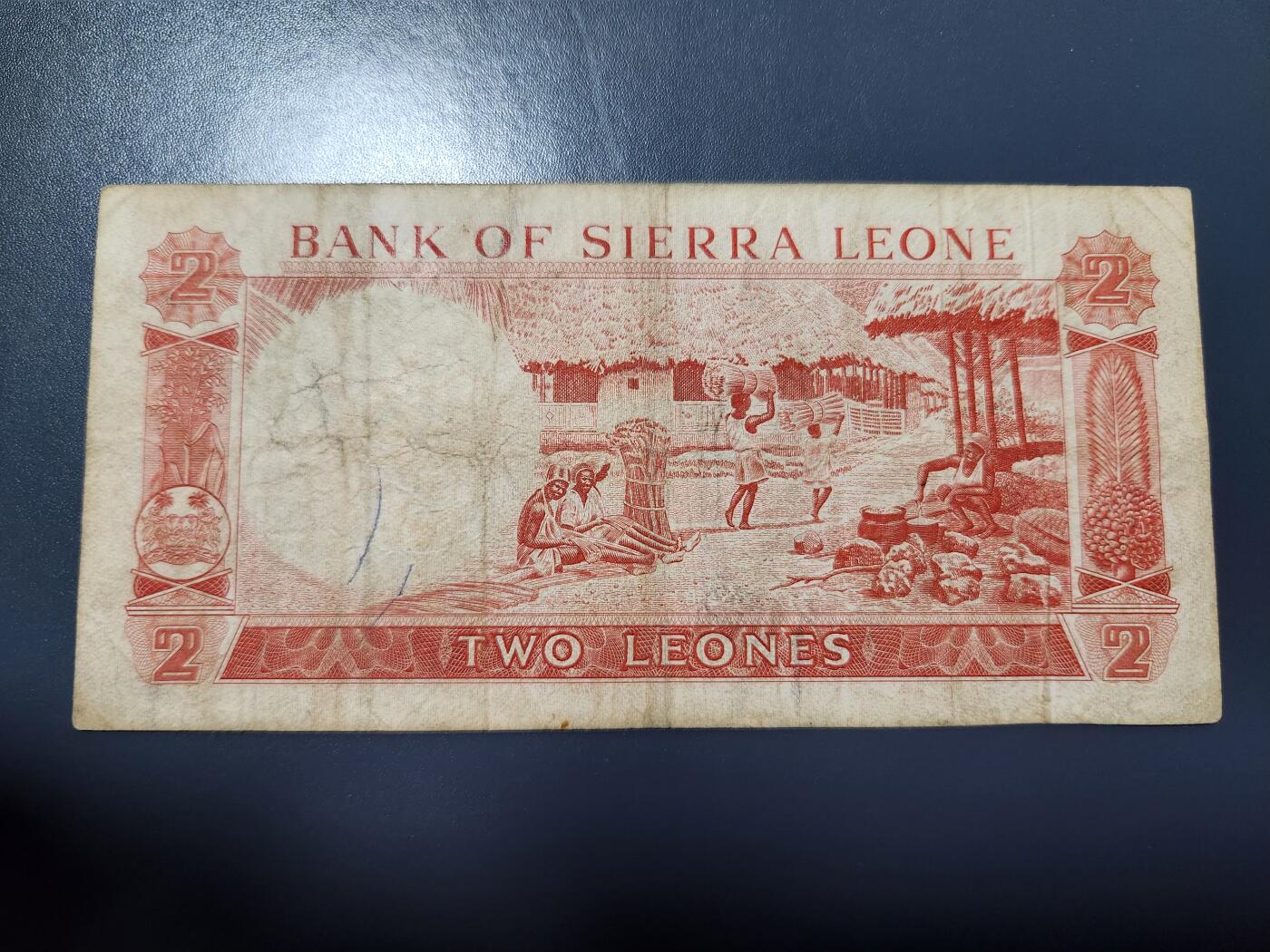 12月6号晚上8点 外国纸币自动截拍第70场 塞拉里昂1964年2利昂 首版 稀少