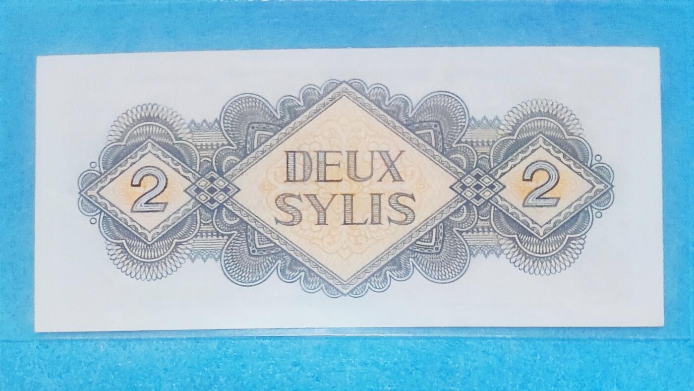 12月5日 🌏全球币章 稀品：1981年，几内亚（北京版），2西里，AA冠，525948号，unc品相