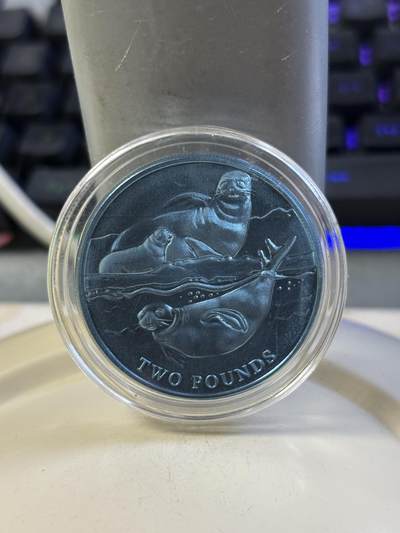 第184期拍卖 - 英属南极领地2017年动物系列海豹绿色纯钛纪念币