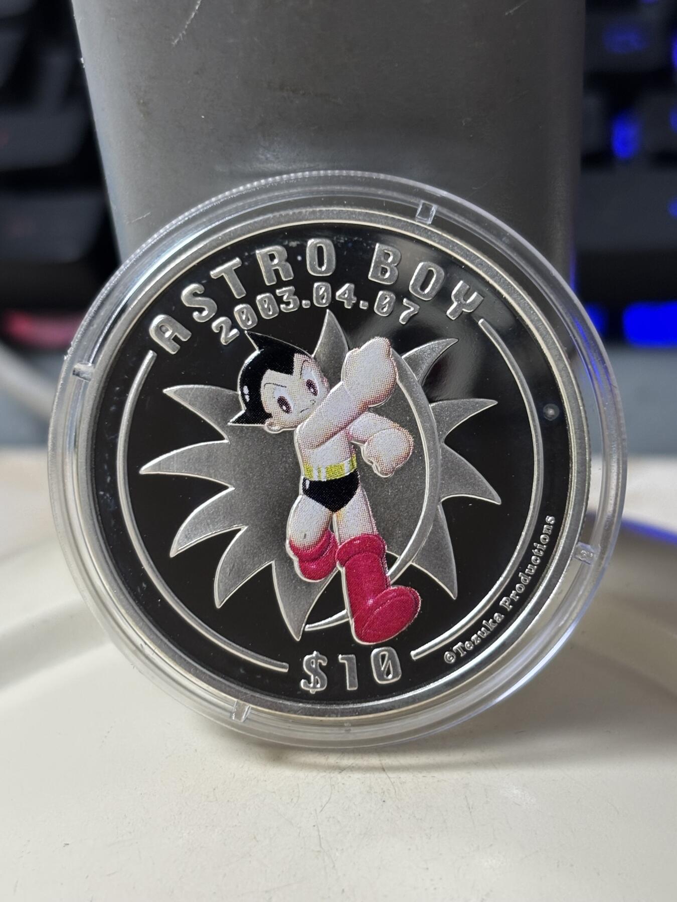 第185期拍卖 塞拉利昂2003年铁臂阿童木精制彩色全套3枚银币，925银，28克*3.，有少许氧化