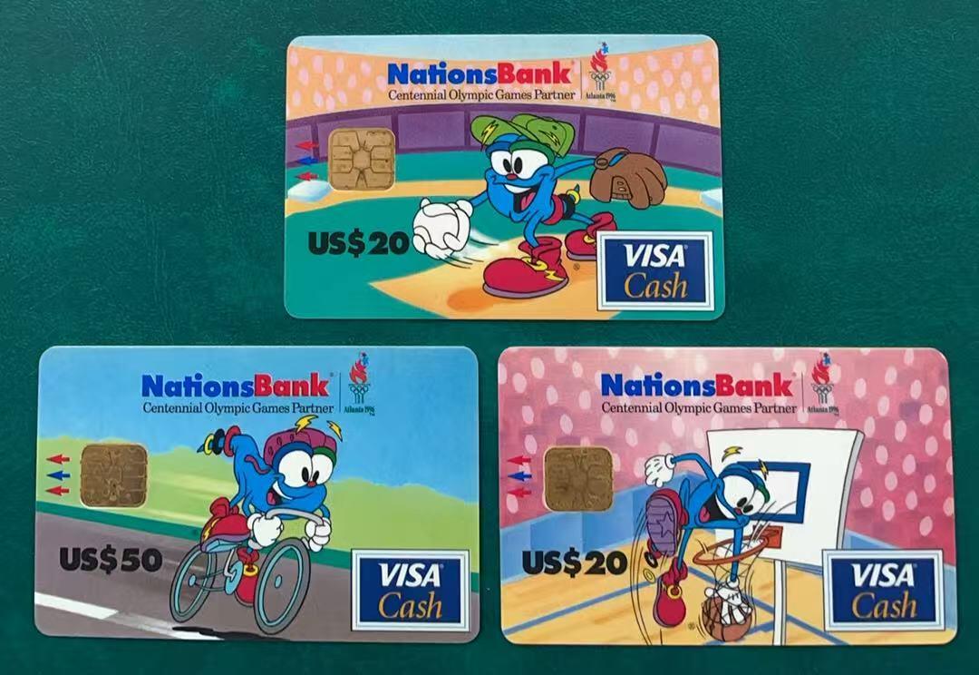 《卡拍》第341期拍卖12月6日晚22：10时延时截拍 美国国家银行VISA Cash现金卡《96亚特兰大奥运会（四）吉祥物系列》三全IC卡，芯片有氧化，中上品。