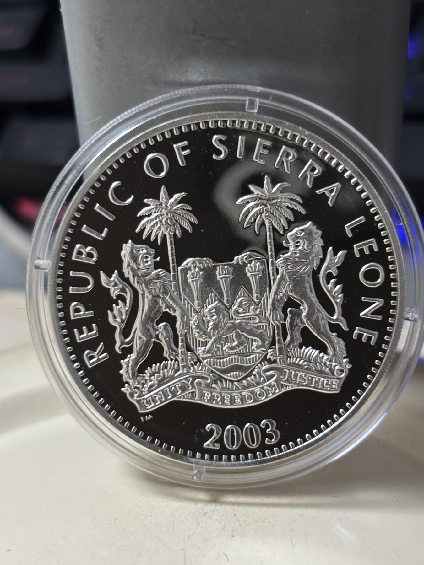 第185期拍卖 塞拉利昂2003年铁臂阿童木精制彩色全套3枚银币，925银，28克*3.，有少许氧化