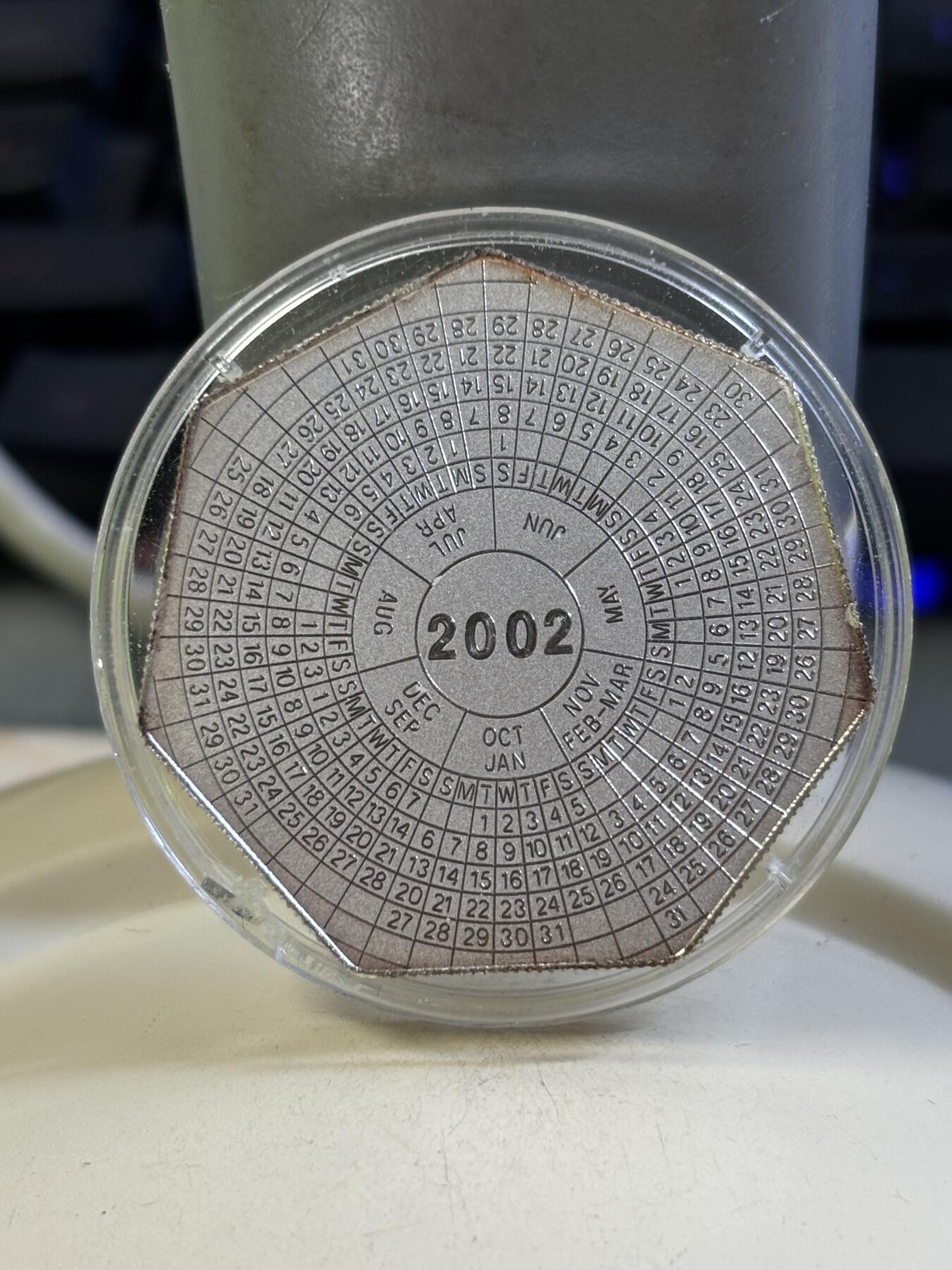 第184期拍卖 赞比亚2001年千禧年系列日历七边形磨砂纪念银币，999银，23克