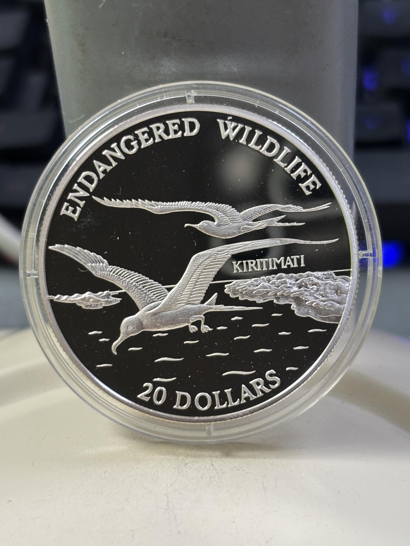 第184期拍卖 基里巴斯1992年保护濒危野生动物精制1盎司念大银币，925银银价399，