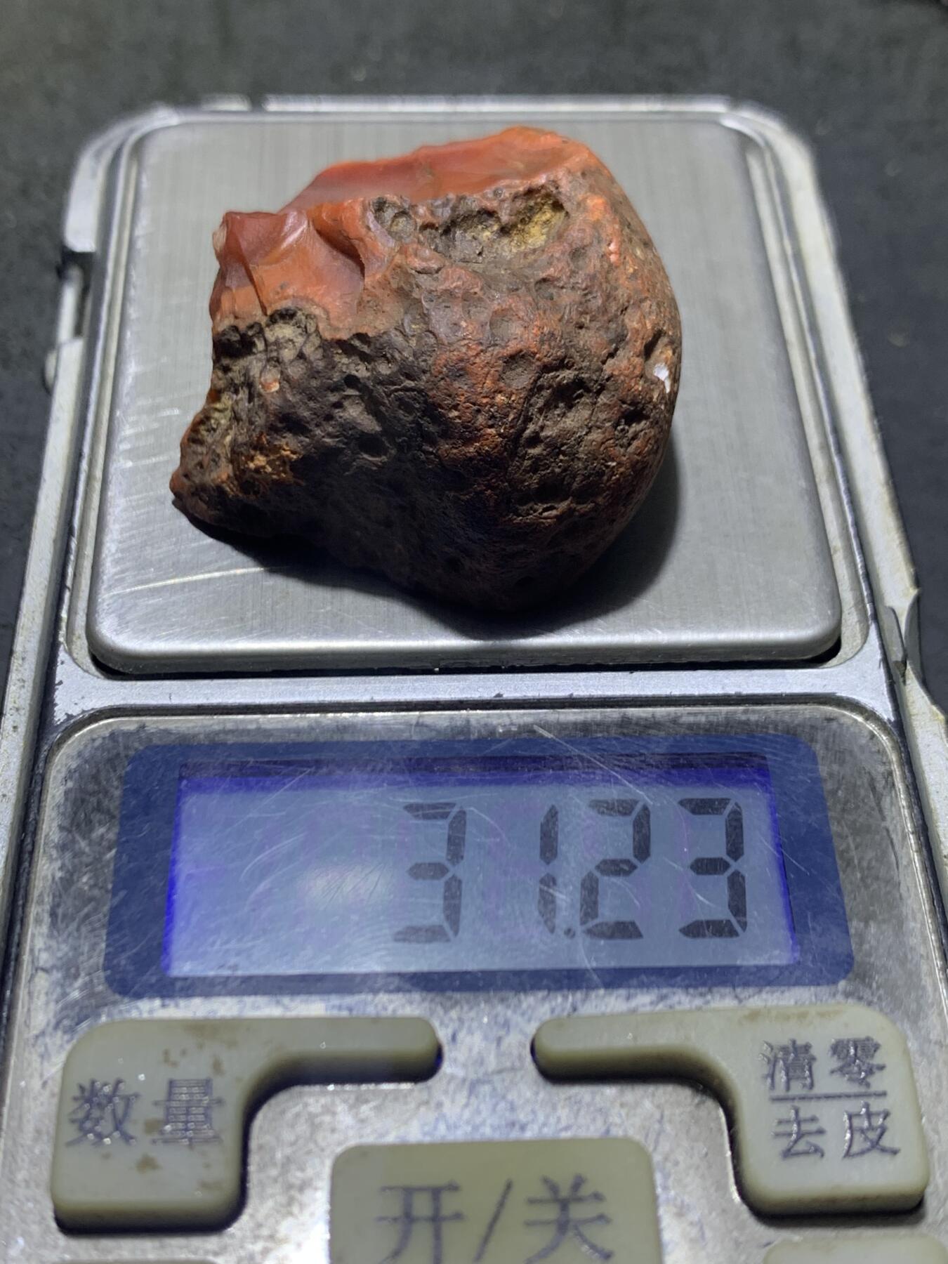 精美原皮柿子红冻料南红玛瑙原石一颗