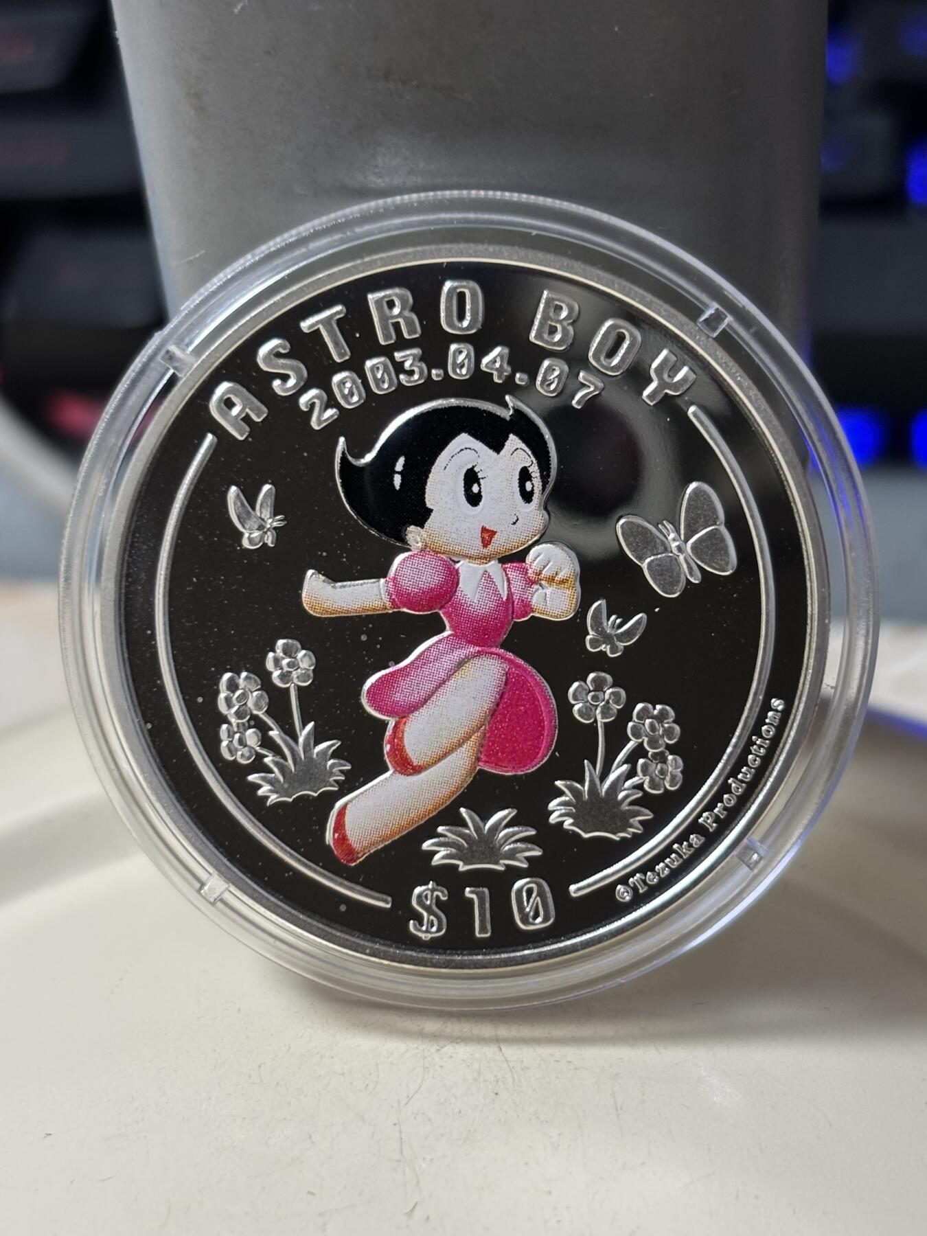 第185期拍卖 塞拉利昂2003年铁臂阿童木精制彩色全套3枚银币，925银，28克*3.，有少许氧化