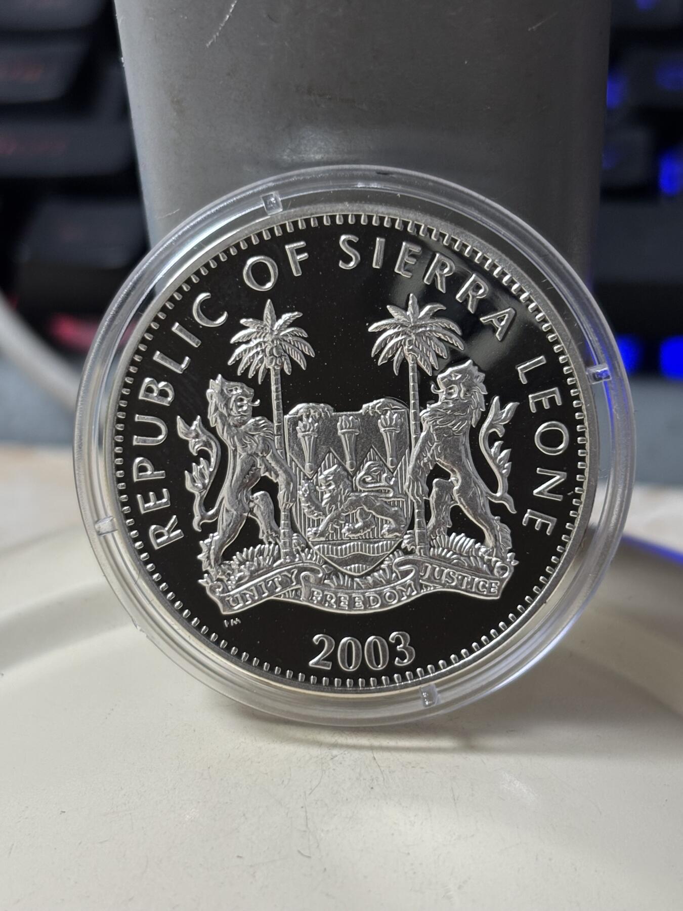 第185期拍卖 塞拉利昂2003年铁臂阿童木精制彩色全套3枚银币，925银，28克*3.，有少许氧化