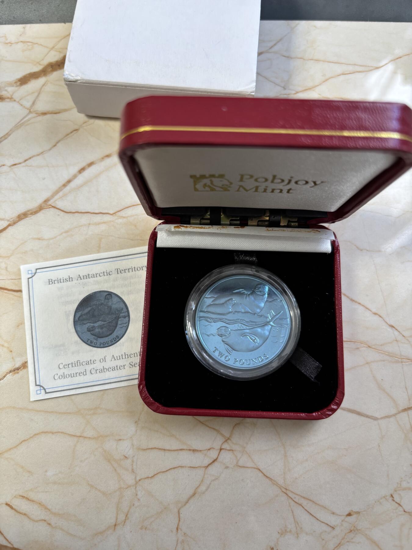 第184期拍卖 英属南极领地2017年动物系列海豹绿色纯钛纪念币