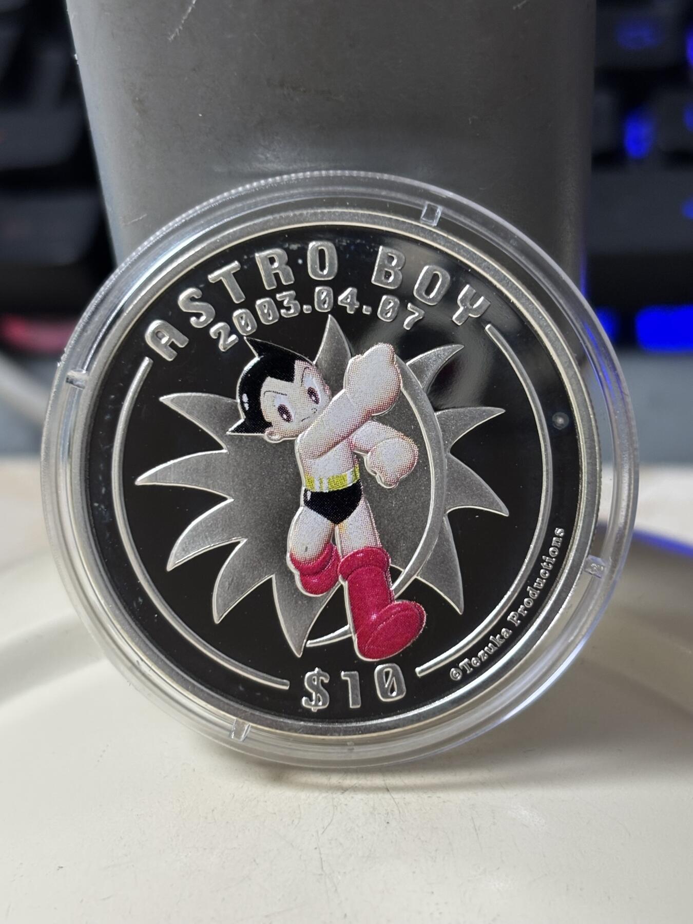 第185期拍卖 塞拉利昂2003年铁臂阿童木精制彩色全套3枚银币，925银，28克*3.，有少许氧化